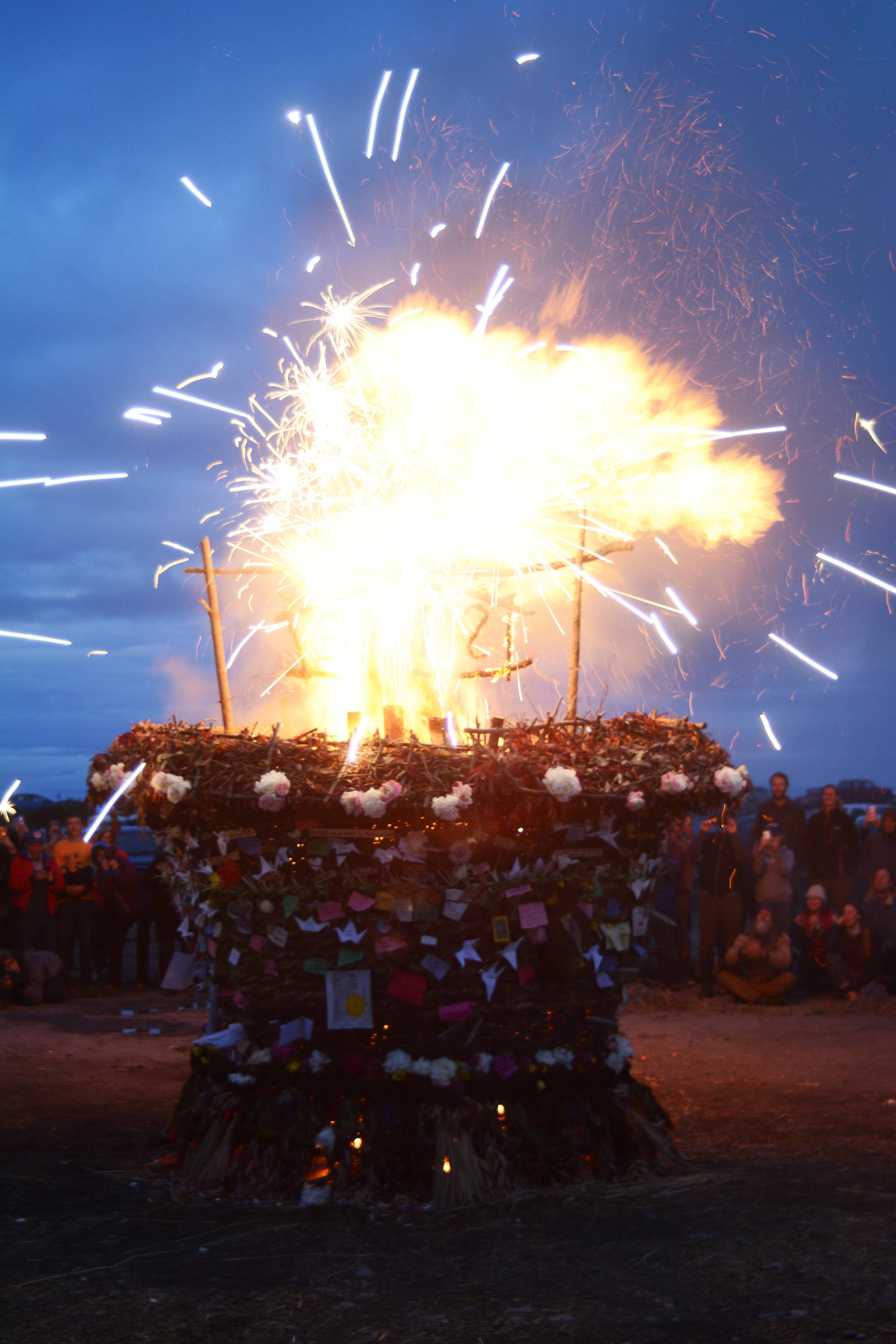 Sparklers ignite as Shine, the 2017 Burning Basket, catches on fire on Sunday, Sept. 10, 2017 at Mariner Park on the Homer Spit. (Photo by Michael Armstrong, Homer News)