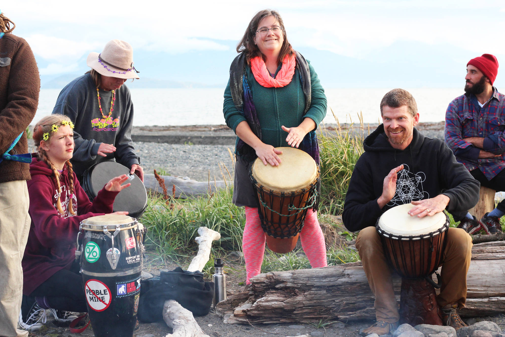 Drummers play music around a fire during the end-of-the-week celebration of the 14th annual Burning Basket Project on Sunday, Sept. 10, 2017 in Mariner Park in Homer, Alaska. (Photo by Megan Pacer/Homer News)