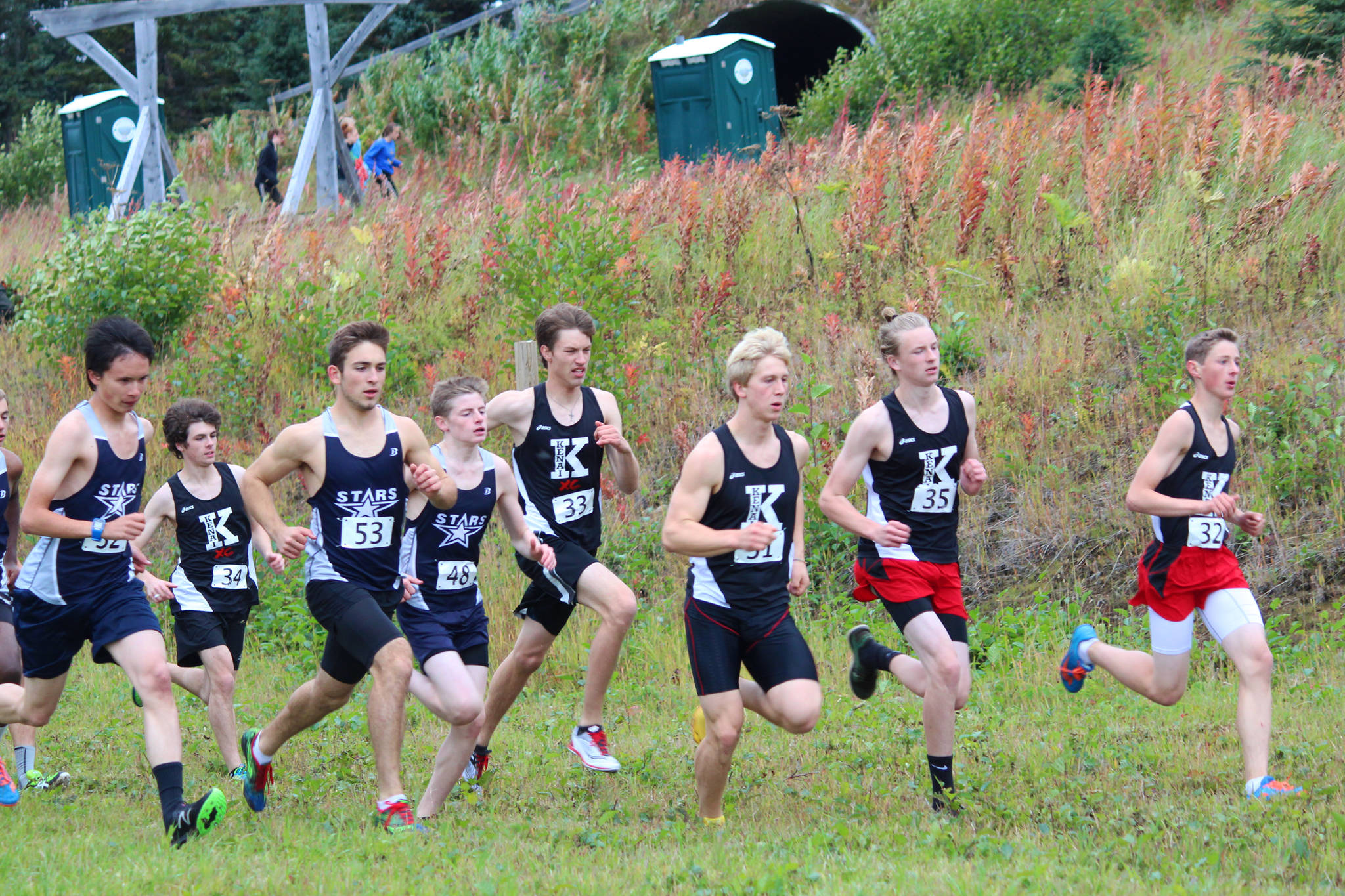 Varsity Cross Country runners take off from the starting line during the Kenai Peninsula Borough Cross Country Running Championships on Tuesday, Sept. 12, 2017 at the Lookout Mountain Trails near Homer, Alaska. (Photo by Megan Pacer/Homer News)