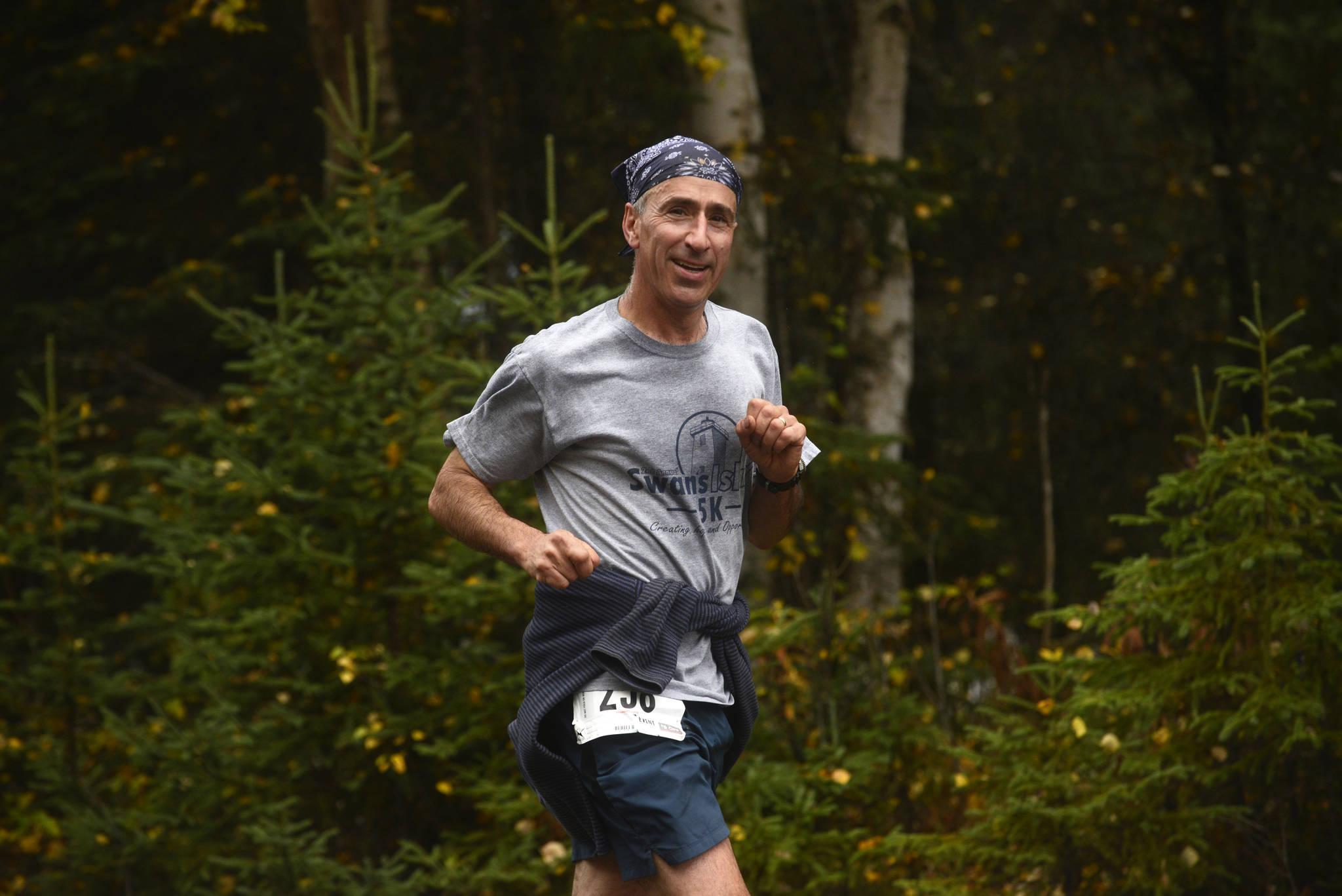 Victor Samoei runs in the Kenai River half-marathon on Sunday, Sept. 24, 2017 near Kenai, Alaska. (Photo by Ben Boettger/Peninsula Clarion)