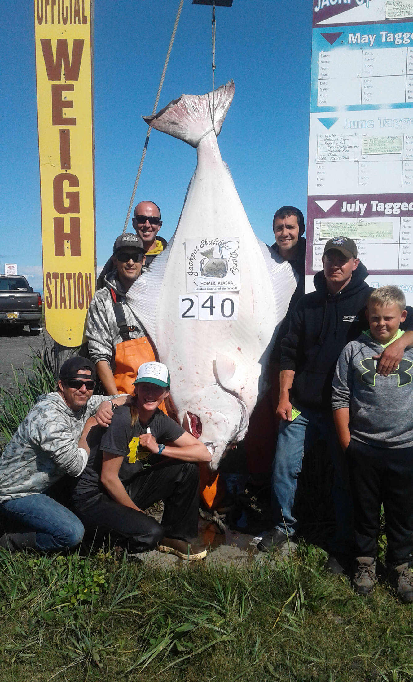 Idaho resident Jack Mills (second from right) poses with his winning 240-pound halibut along with the rest of the crew in Homer, Alaska. Mills won the 2017 Homer Jackpot Halibut Derby, and a prize for $15,241.10. (Photo courtesy Homer Chamber of Commerce and Visitor Center)