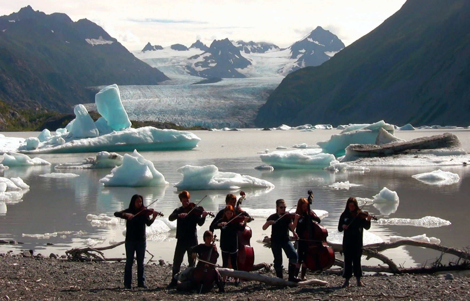 The Homer Youth String Orchestra performs at Grewingk Glacier in August as part of the filming of “Blue Ice.” (Photo submitted)