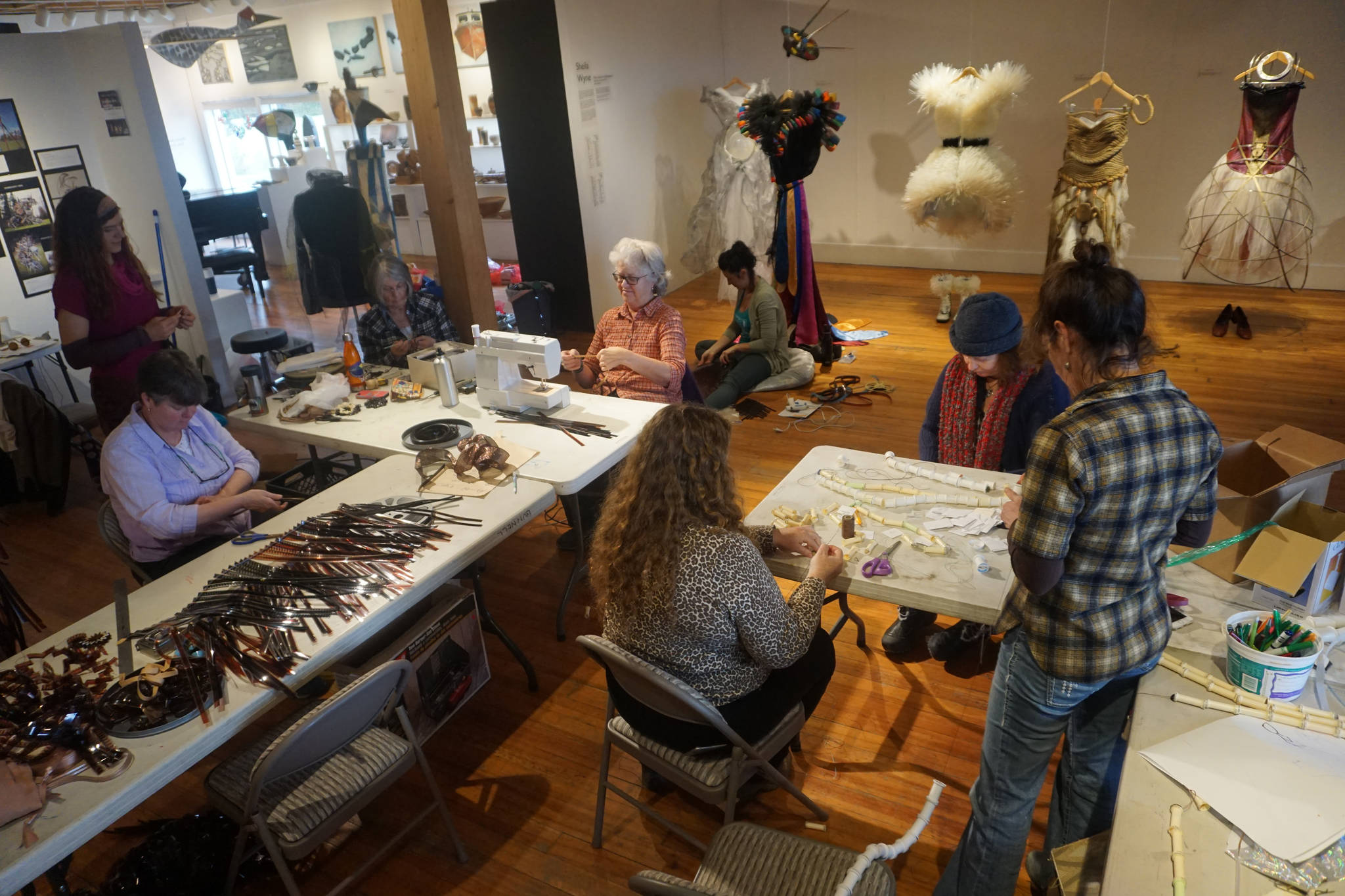 Participants assemble Wearable Arts pieces Saturday, Oct. 14, 2017 at a workshop with Sheila Wyne at the Bunnell Street Arts Center in Homer, Alaska. Wyne is artist in residence at Bunnell at a residency sponsored by the Homer Fiber Arts Collective. (Photo by Michael Armstrong)