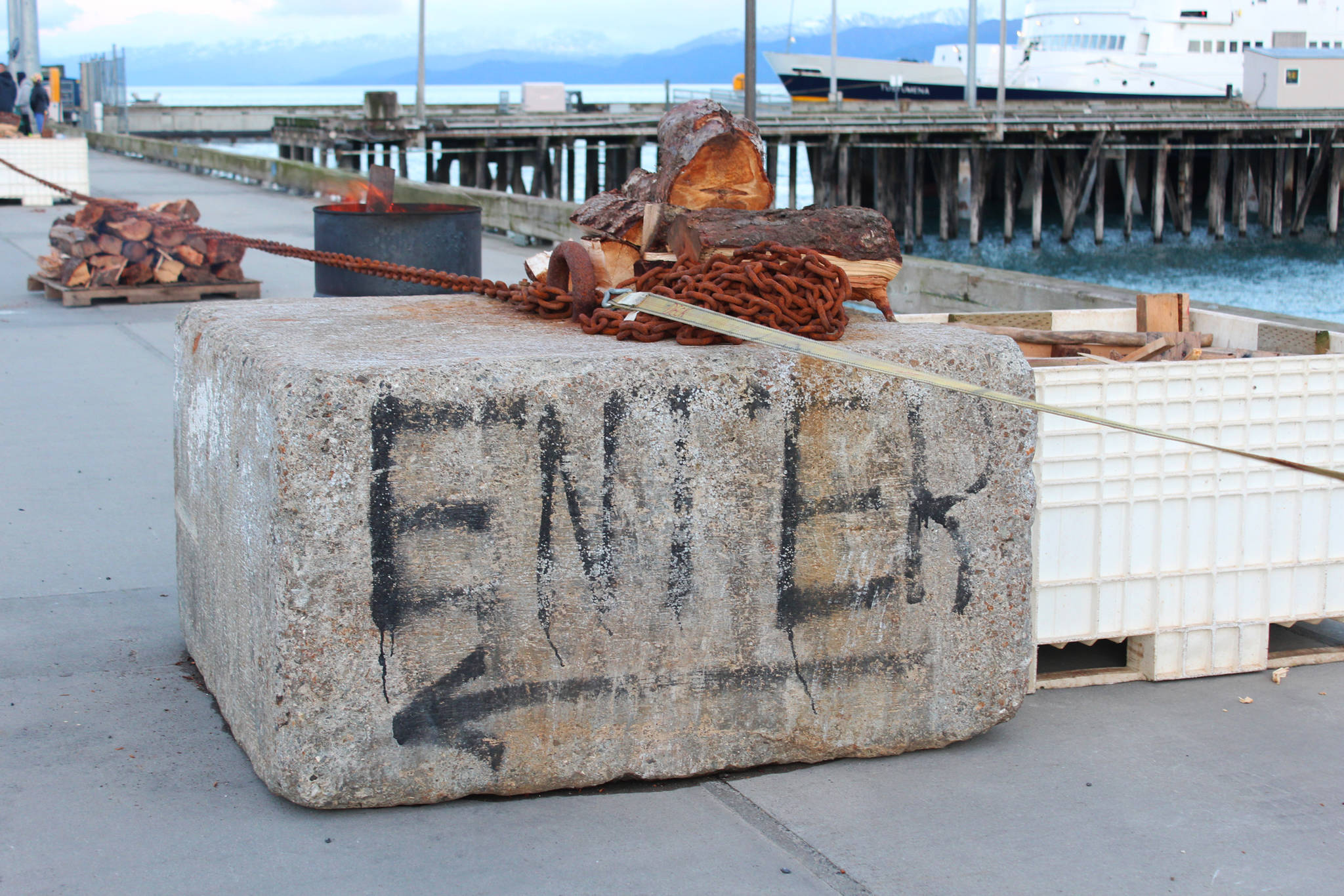 A concrete block points the way for attendees of this year’s Haunted Hickory event aboard the U.S. Coast Guard Cutter Hickory on Thursday, Oct. 26, 2017 in Homer, Alaska. Hundreds of people lined up and waited to be scared by the ship’s crew in the annual spooky tour. (Photo by Megan Pacer/Homer News)