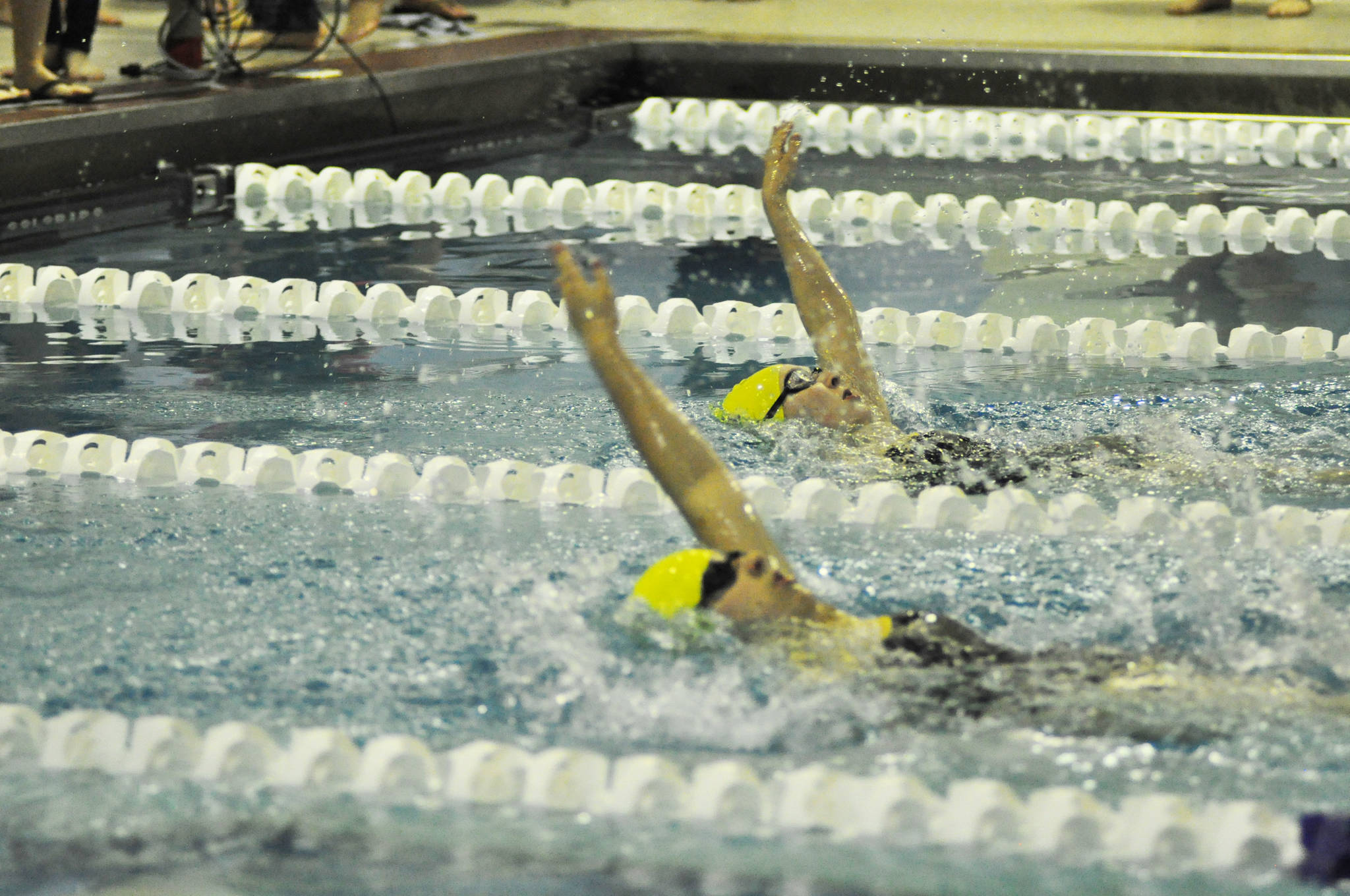 Freshmen Mia Groves (foreground) and Katelyn Engebretsen (background) compete in the Region III Swimming and Diving Championships held Friday and Saturday, Oct. 27-28, 2017 in Palmer, Alaska. (Photo submitted)