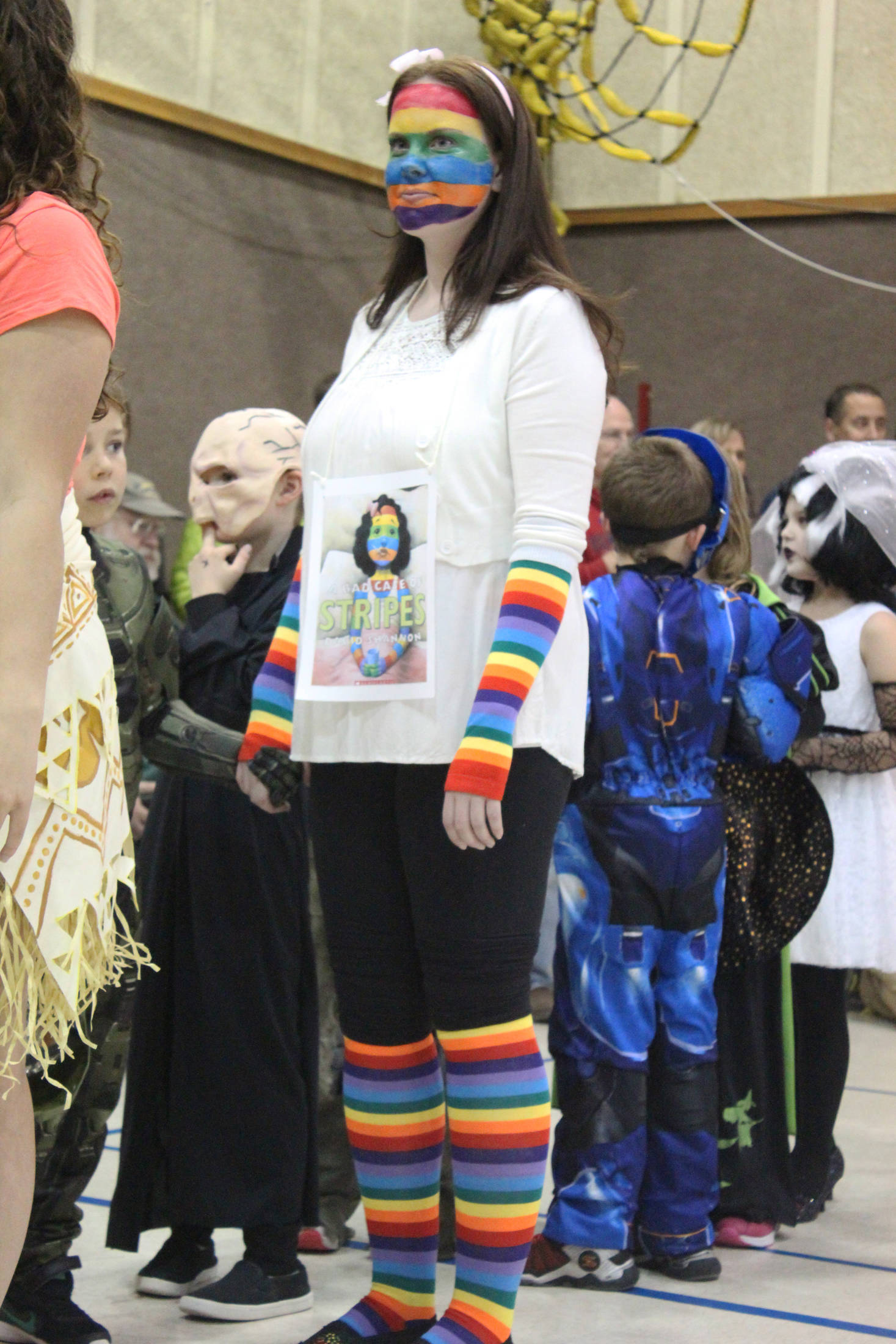 Jennifer Olson, a teacher a Paul Banks Elementary School, walks in the school’s Halloween costume parade as “A Bad Case of the Stripes” on Tuesday, Oct. 31, 2017 at the school in Homer, Alaska. (Photo by Megan Pacer/Homer News)