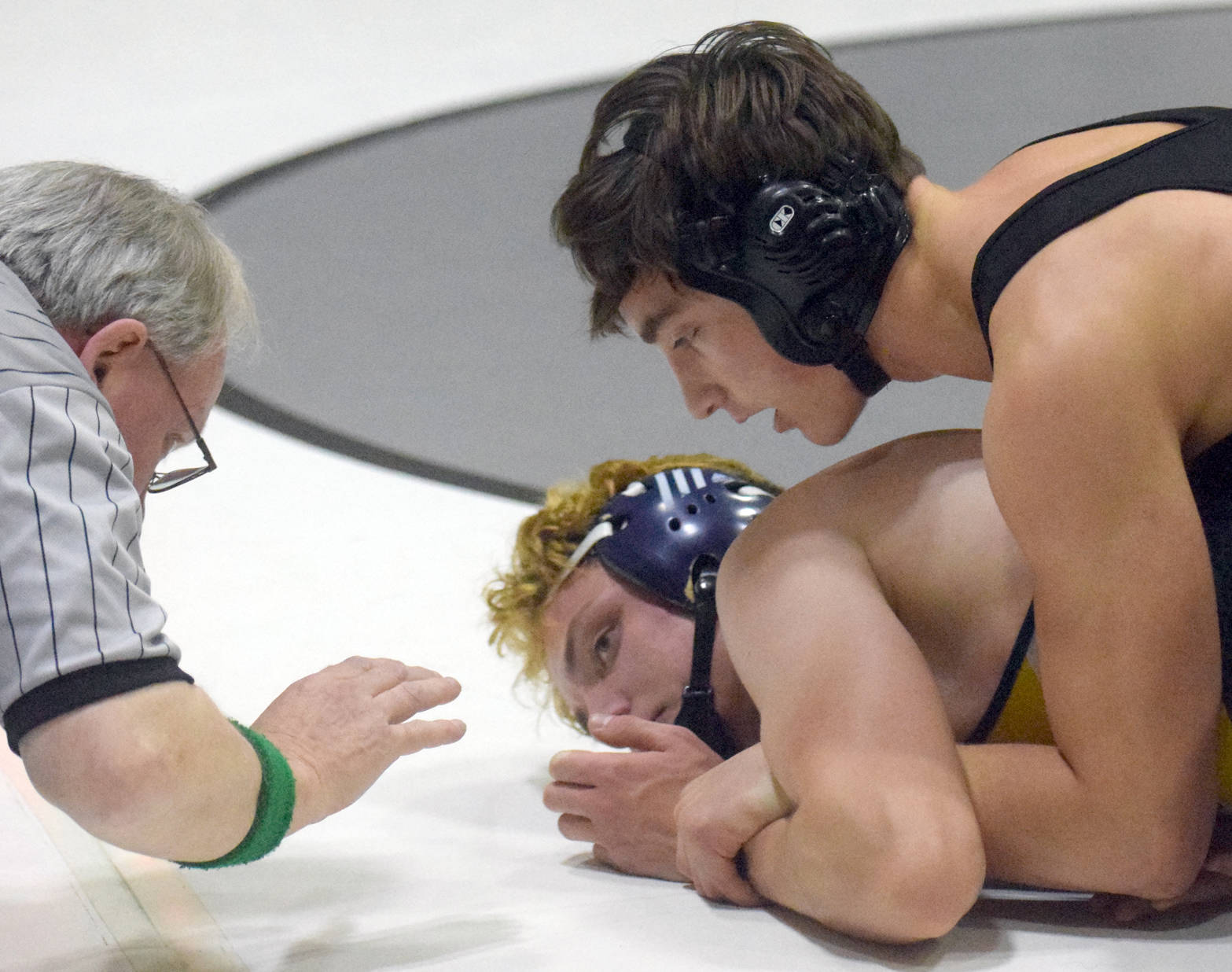 Photo by Jeff Helminiak/Peninsula Clarion Colony’s Eric Christy controls Homer’s Chris Cudaback at 170 pounds en route to a 11-0 major decision in the championship dual of the Peninsula Duals on Saturday, Nov. 11 at Nikiski High School in Nikiski.