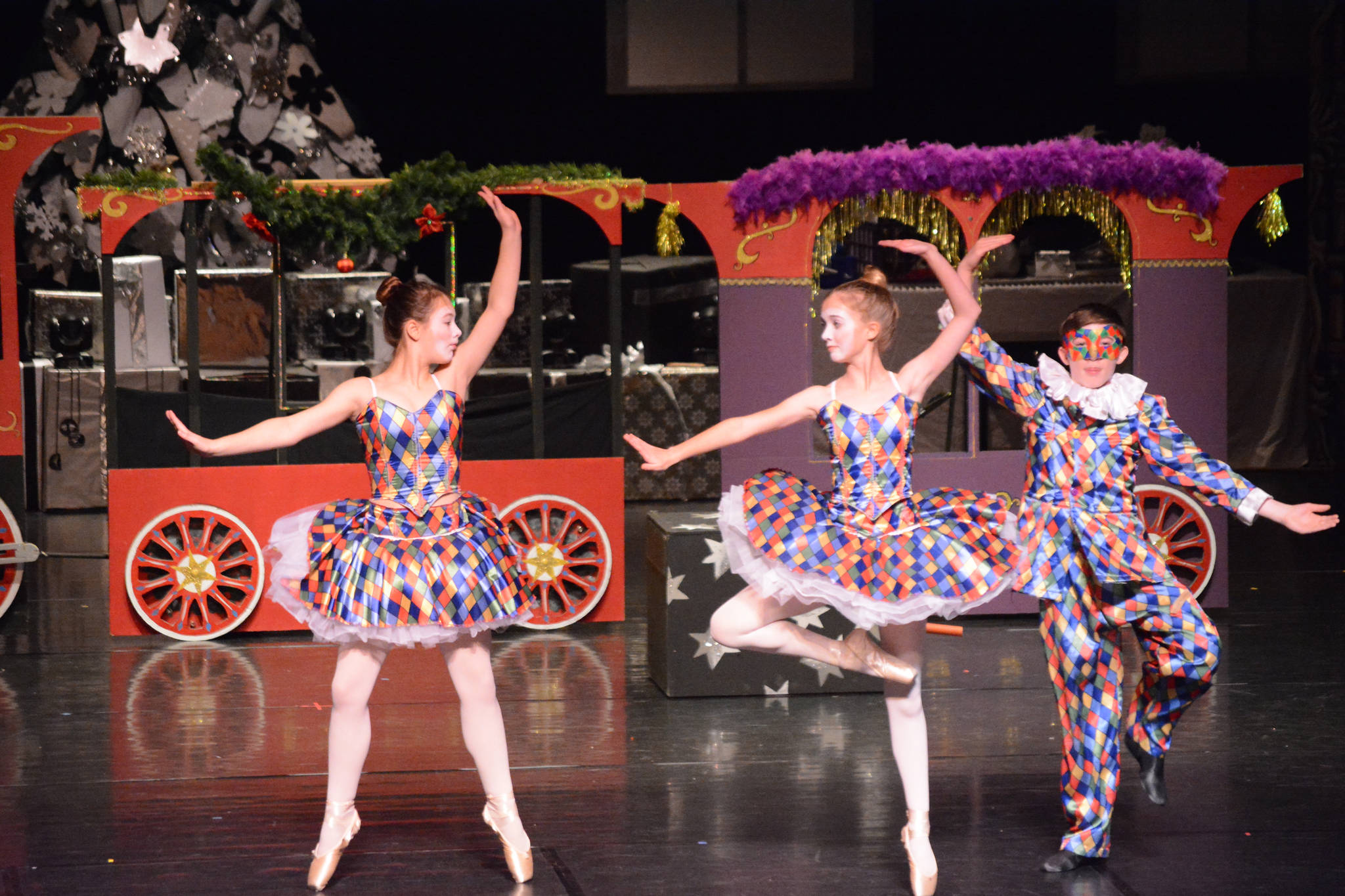 Serena Funkhauser, Ava Halstead and Lance Seneff as the harlequin toys rhearse a scene at the Mariner Theatre Friday, Nov. 24, 2017 in Homer, Alaska for the Nutcracker Ballet. (Photo by Michael Armstrong, Homer News)