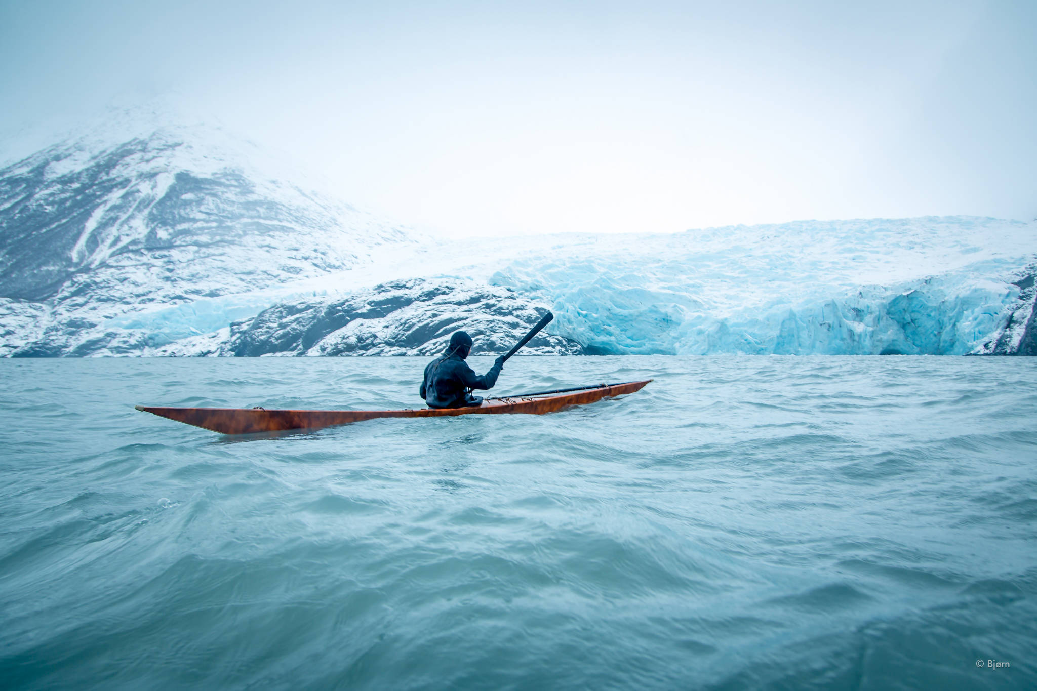 Maligiaq Padillia kayaks in a traditional kayak. (Photo courtesy Bjorn Olson)