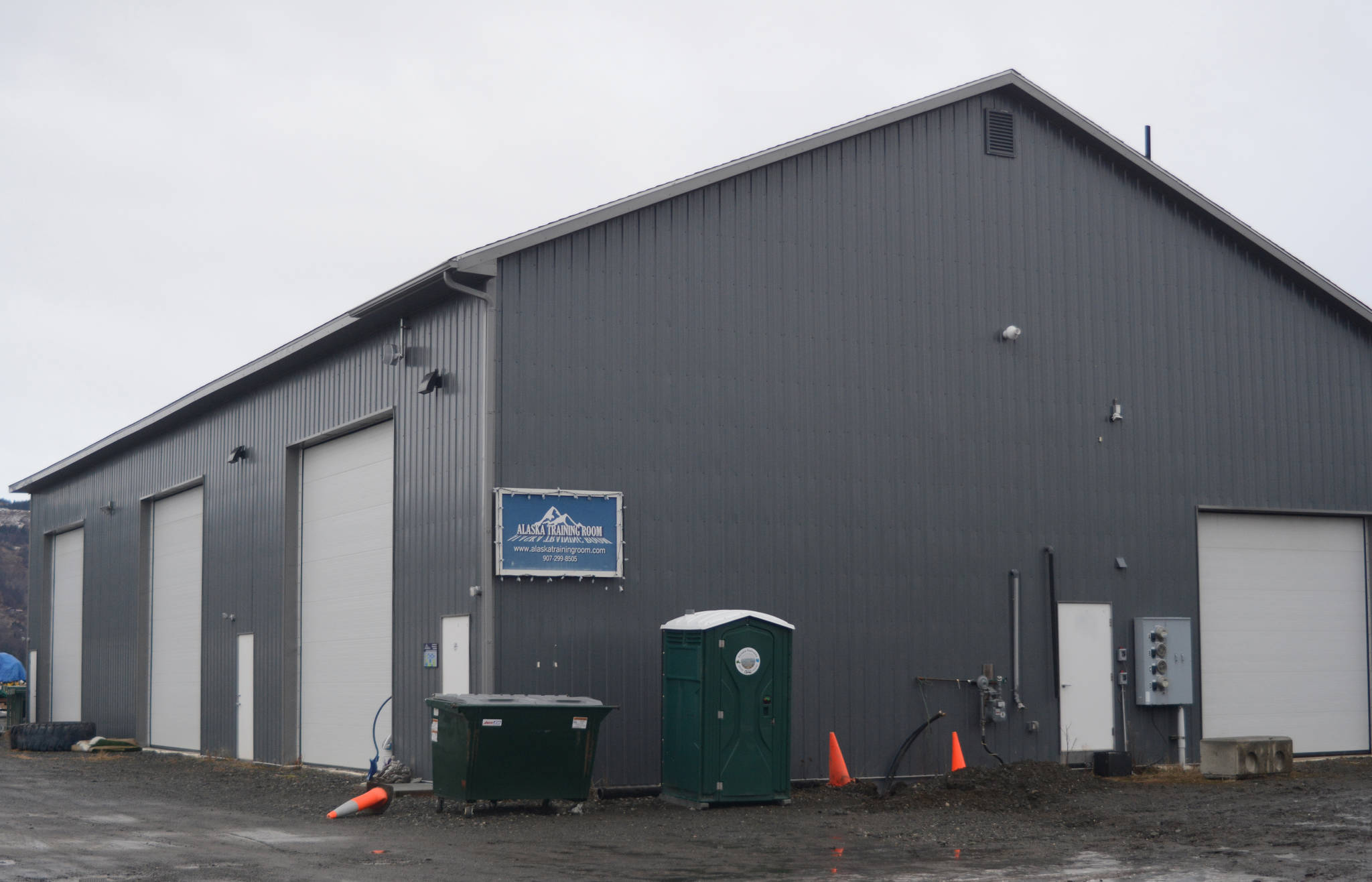 Alaska Loven It plans to operate a marijuana standard cultivation facility in this 5,000-square-foot building, shown in this Tuesday, Jan. 16, 2018 photo, on Kachemak Drive near the east end of the Homer Airport runway. Alaska Training Room currently uses the front of the building, but owner Mary Jo Campbell said she plans to move this month to a new location on Ocean Drive. (Photo by Michael Armstrong/Homer News).