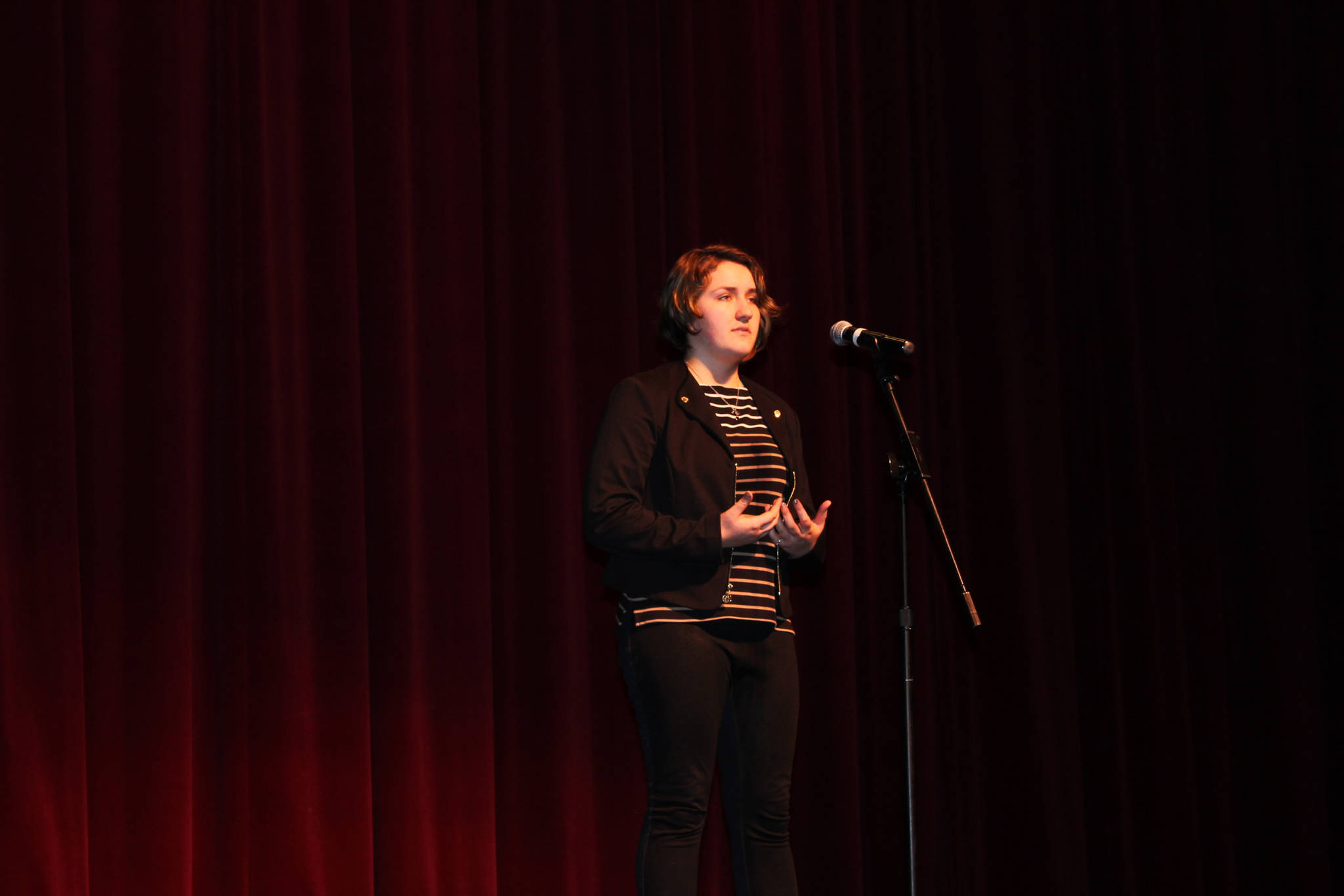 Homer High School student Iris Downey performs during a Poetry Out Loud event at the school Wednesday, Jan. 24, 2018 in Homer, Alaska. Held during the school’s Focused On Learning session, the competition is part of a national organization that teaches students memorization, recitation, public speaking skills and literary history. Poetry Out Loud has reached more than 3 million students and 50,000 teachers from every state, as well as Washington, DC, the US Virgin Islands and Puerto Rico, according to the organization’s website. (Photo courtesy Sean Campbell)