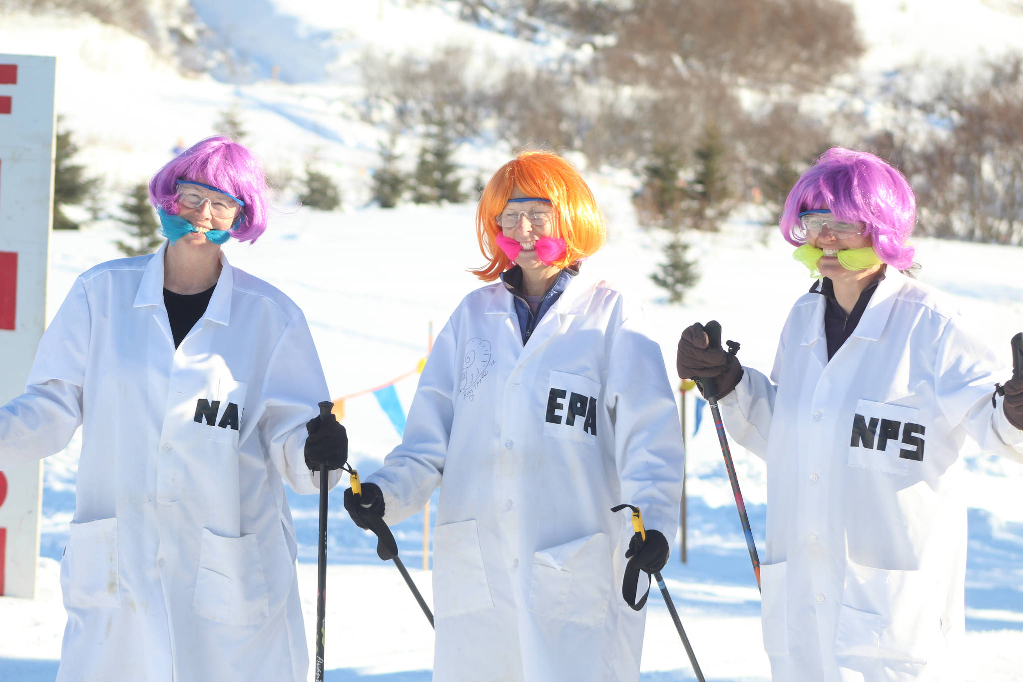 Marian Aplin, Sue Mauger and Heather Renner pose in their “Gaggle of Gagged Scientists” costume at the Ski for Women event on Feb. 5, 2017 at the Lookout Ski Trails in Homer, Alaska. (Photo by Anna Frost, Homer News)
