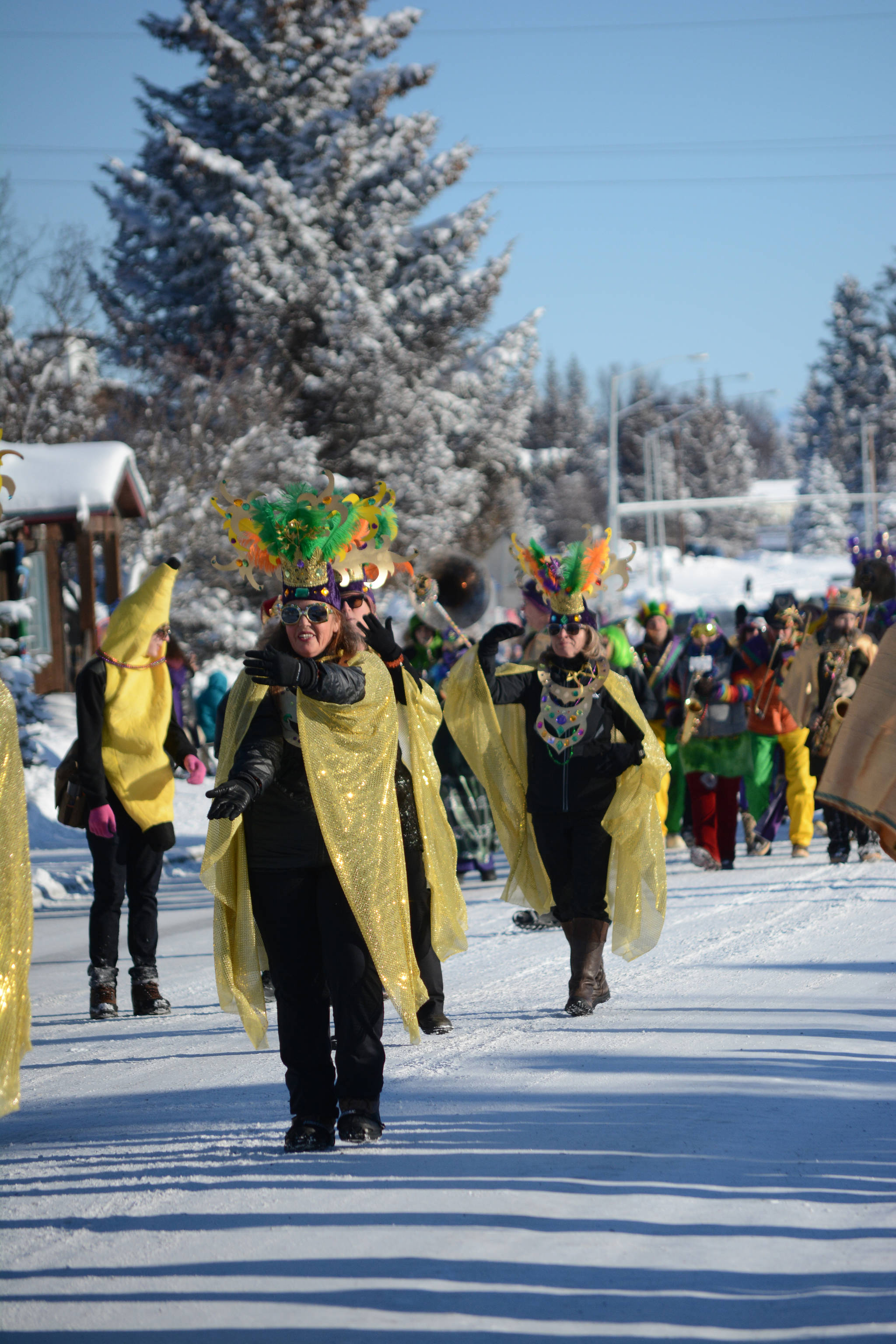 The Krewe of Gambrinus marches in the Homer Winter Carnival parade on Saturday. They won Best of Show in the parade contest. (Photo by Michael Armstrong, Homer News)