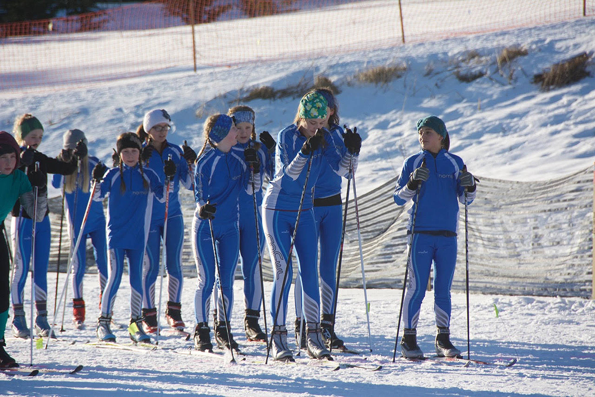 The Homer Middle School girls’ cross-country ski team prepares for a race Friday, Feb. 16, 2018 at the Lookout Mountain Ski Trails near Homer, Alaska. (Photo submitted)