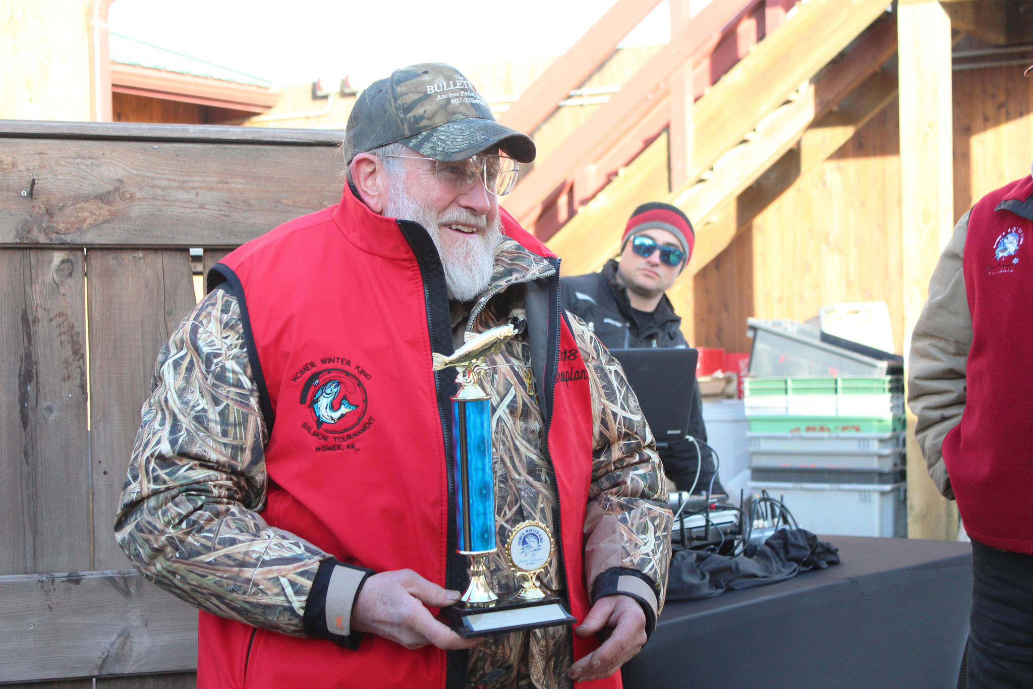 Charlie Edwards of the Optimist holds his trophy after winning this year’s Winter King Salmon Tournament on Saturday, March 24, 2018 on the Spit in Homer, Alaska. His winning fish weighed 24.6 pounds. (Photo by Megan Pacer/Homer News)