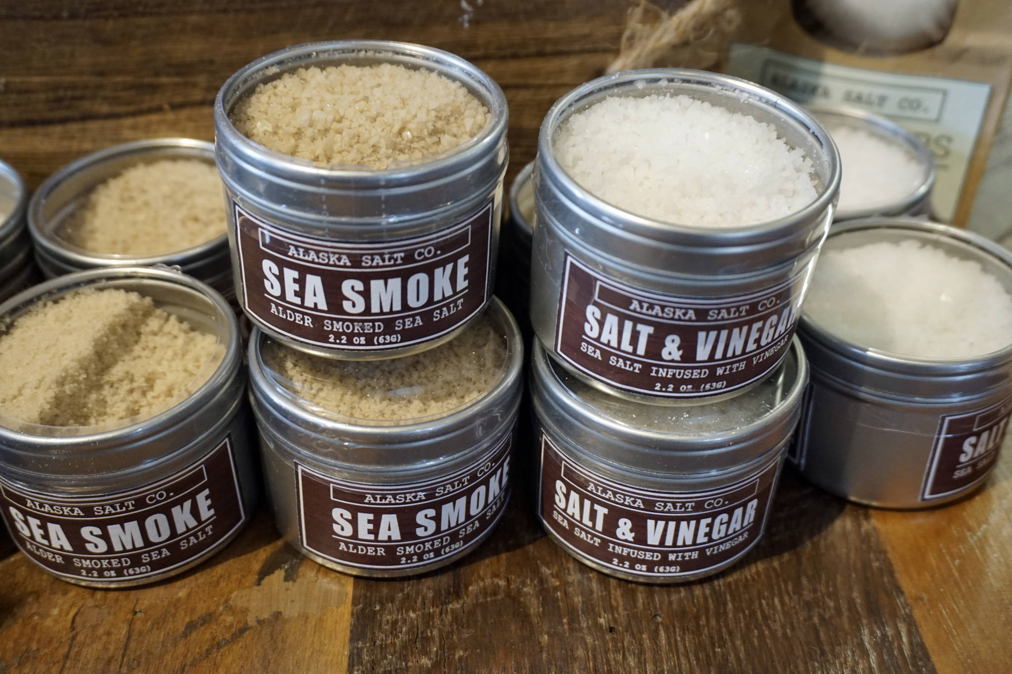 A display of sea salts made by the Alaska Salt Co., Britni and Corey Siekaniec’s salt company, on display at her art show, “Salt,” at Grace Ridge Brewery, Homer, Alaska. (Photo by Michael Armstrong, Homer News)