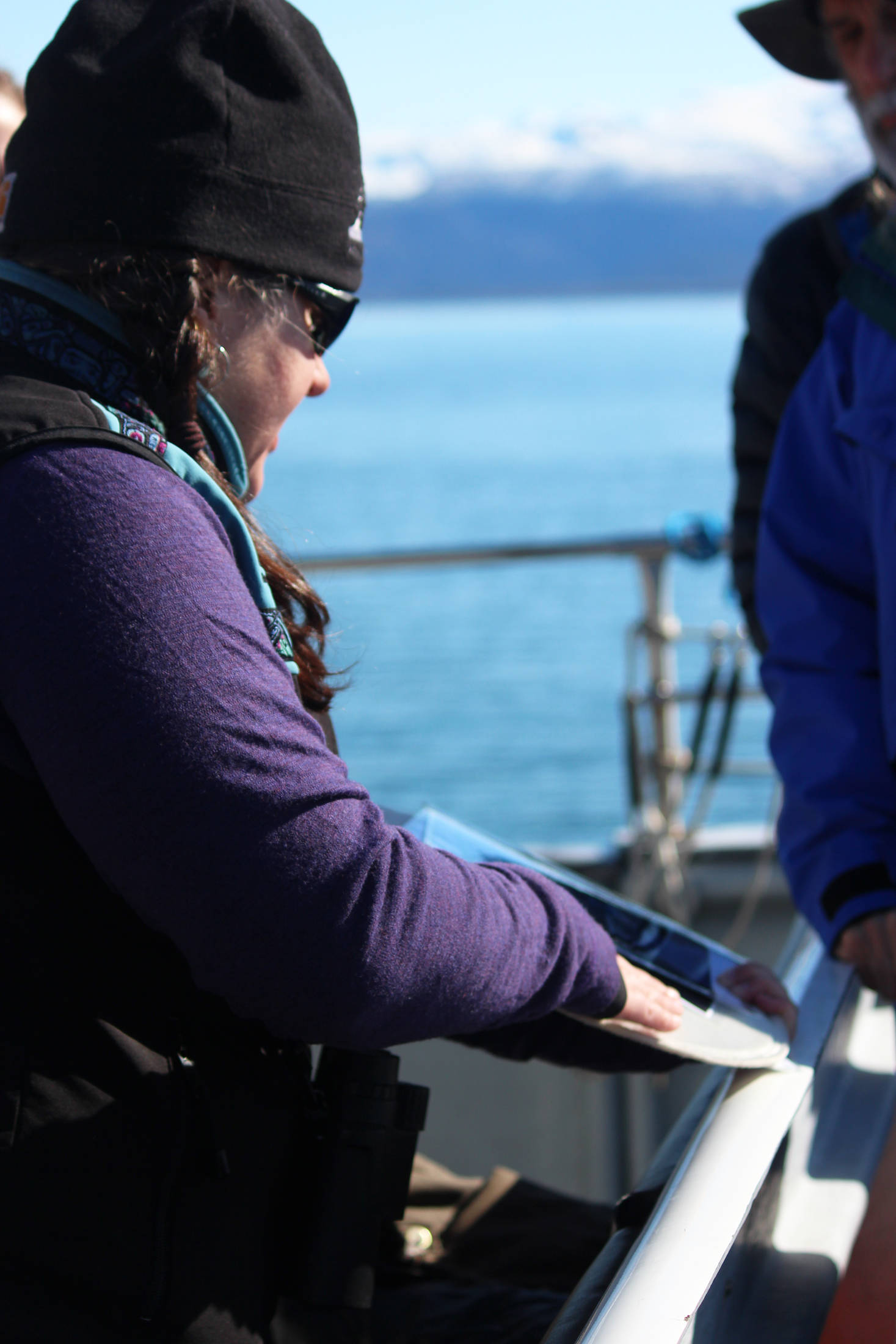 Photo by Megan Pacer/Homer News RCAC Outreach Coordinator Lisa Matlock shows Homer area residents aboard the Discovery an example of the filters used to catch oil during a spill while on a tour of annual oil spill response training in Kachemak Bay on Saturday, April 14 in Homer.