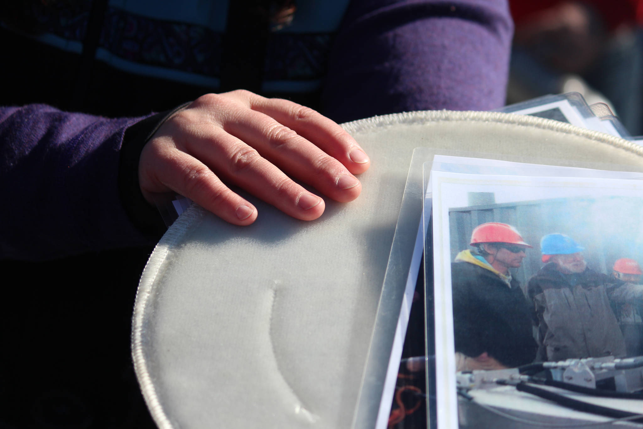 RCAC Outreach Coordinator Lisa Matlock shows Homer area residents aboard the Discovery an example of the filters used to catch oil during a spill while on a tour of annual oil spill response training in Kachemak Bay on Saturday, April 14, 2018 in Homer, Alaska. The public tour was a first for Homer and was hosted by the Prince William Sound Regional Citizens’ Advisory Council in conjunction with Alyeska Pipeline, Alaska Coastal Marine and the Center for Alaskan Coastal Studies. (Photo by Megan Pacer/Homer News)