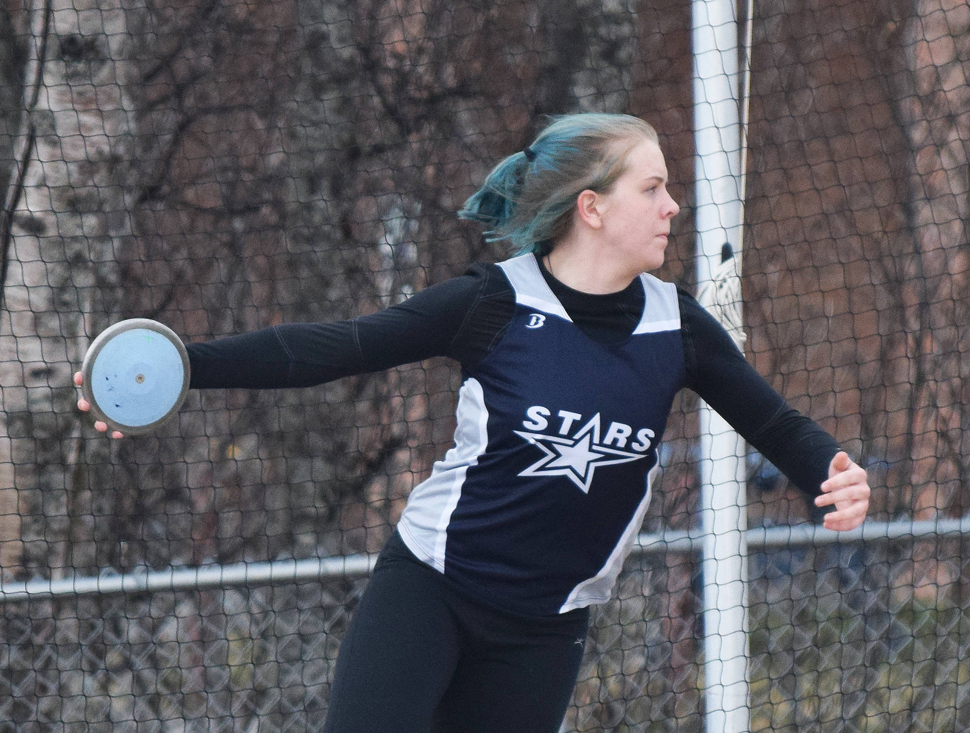 Soldotna senior Emily Pieh throws the discus Saturday afternoon at Homer High School. (Photo by Joey Klecka/Peninsula Clarion)