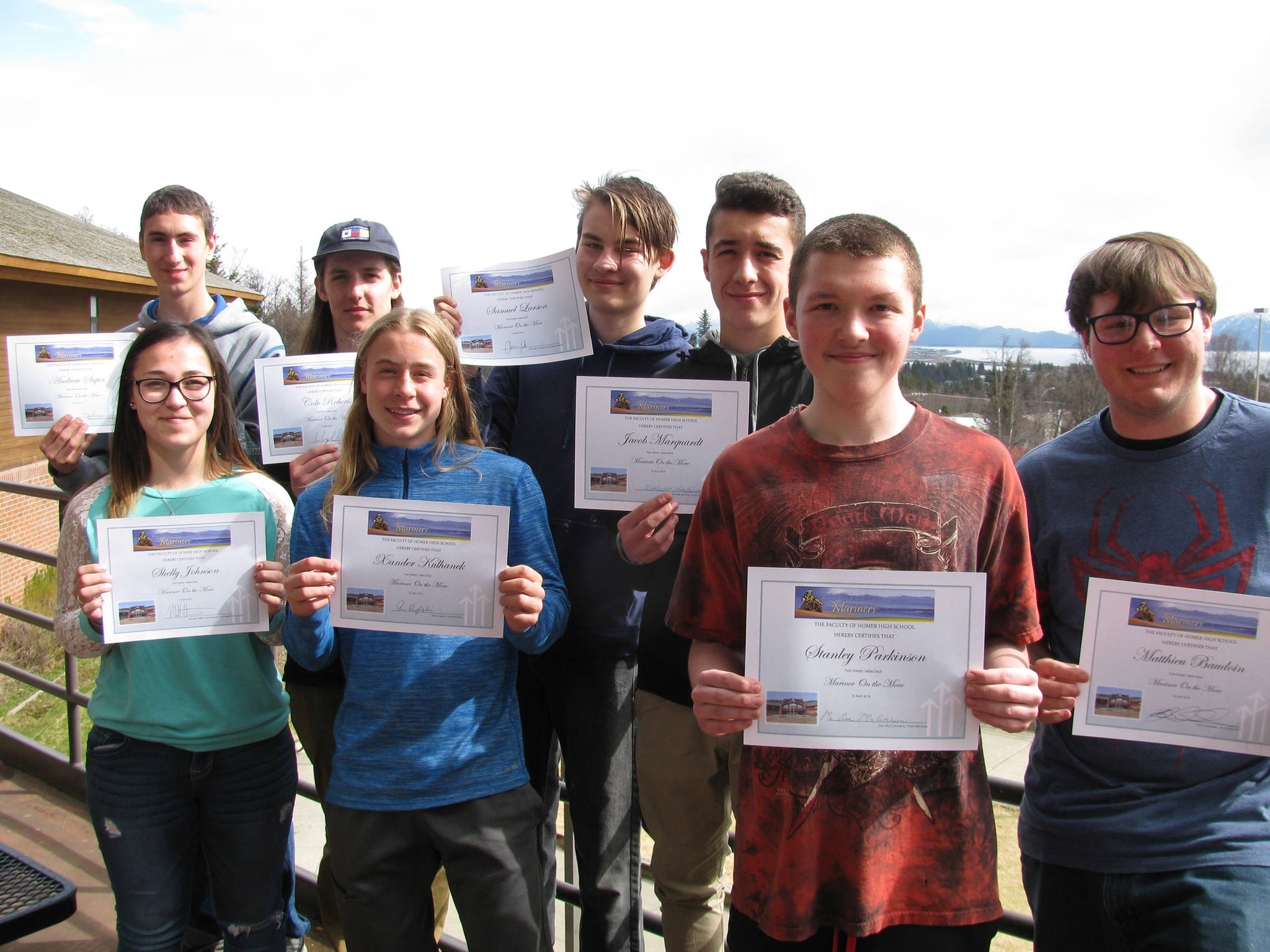 Homer High School students hold up their Mariner on the Move awards. Back row: From left to right, Andrew Super, Cole Roberts, Sam Larsen and Jacob Marquardt. Front row: Shelly Johnson, Xander Kulhanek, Stanley Parkinson and Matthieu Baudoin. (Photo submitted)