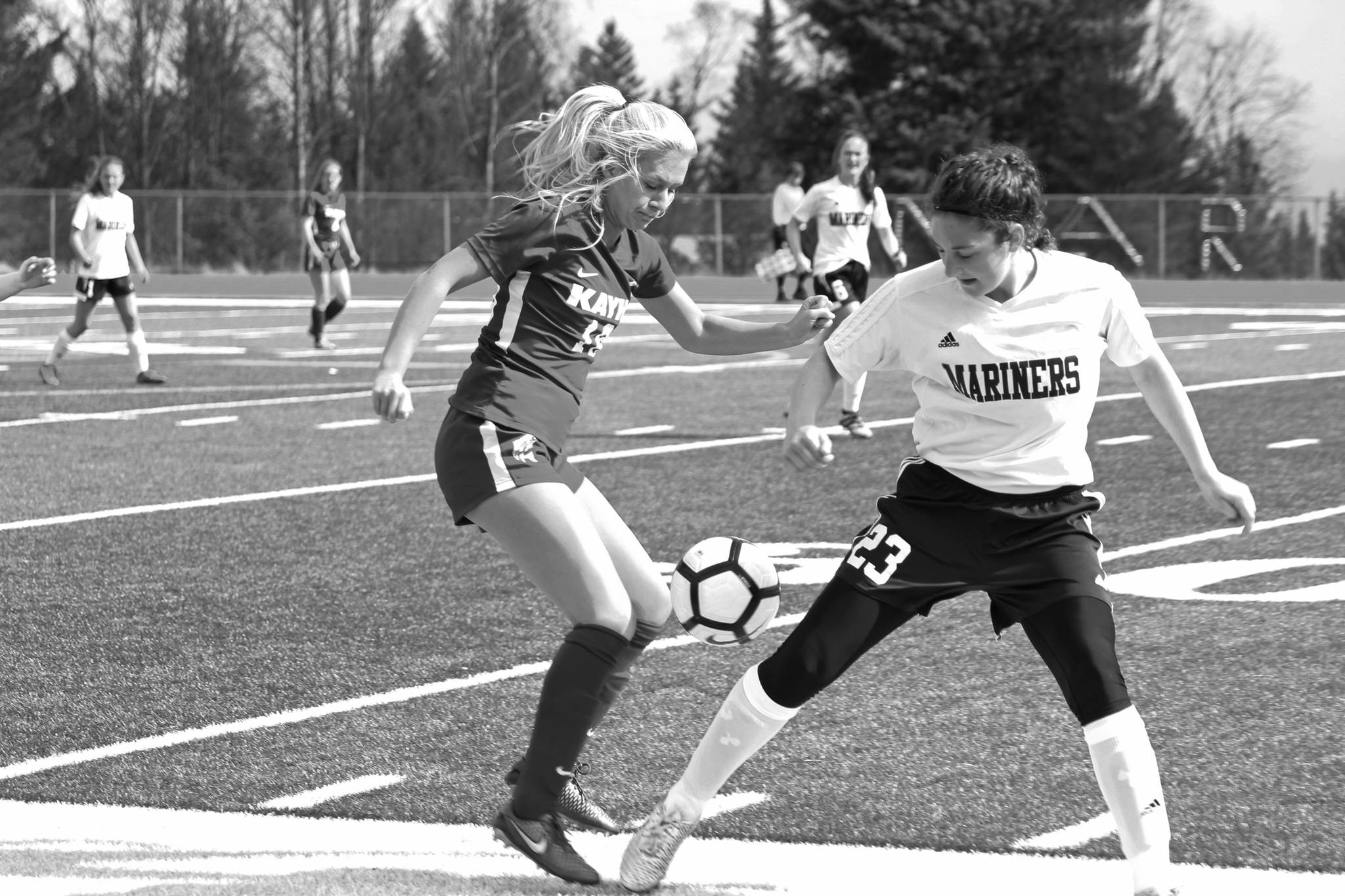 Photo by Megan Pacer/Homer News Ketchikan’s Leah Benning battles for control of the ball with Homer’s Rylyn Todd during their game Friday, May 4 at Homer High School. Ketchikan won the match 2-1.
