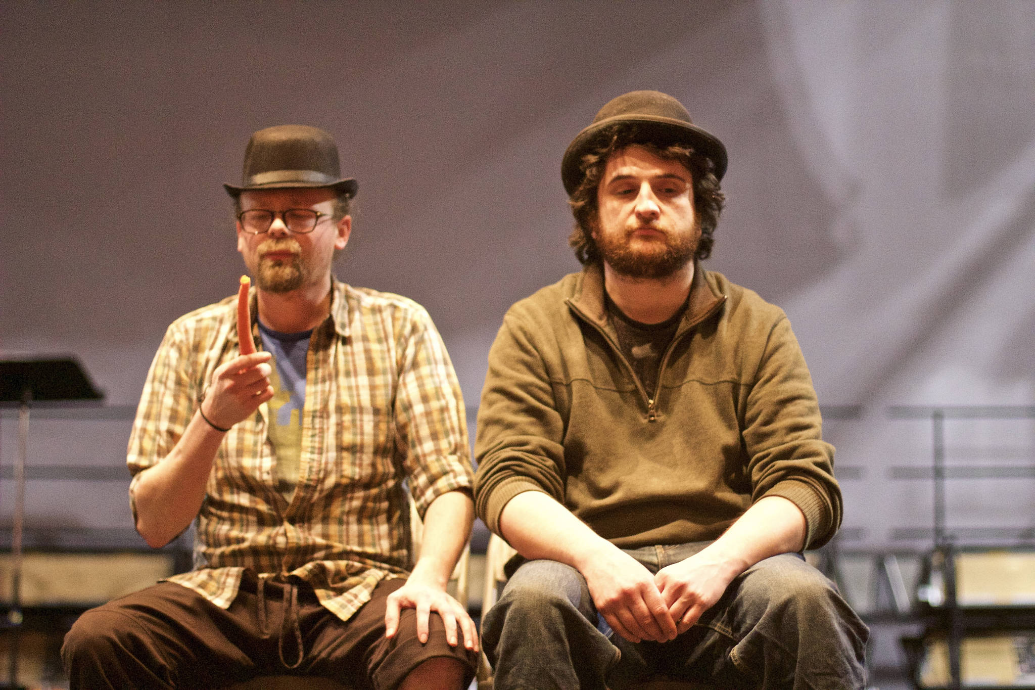 Matt Lees, left, and Peter Sheppard, right practice a scene from Samuel Beckett’s “Waiting for Godot.” Sheppard directs the play, opening at 7 p.m. Friday, May 25, for the start of Pier One Theatre’s 2018 season. (Photo by Richard Rose)