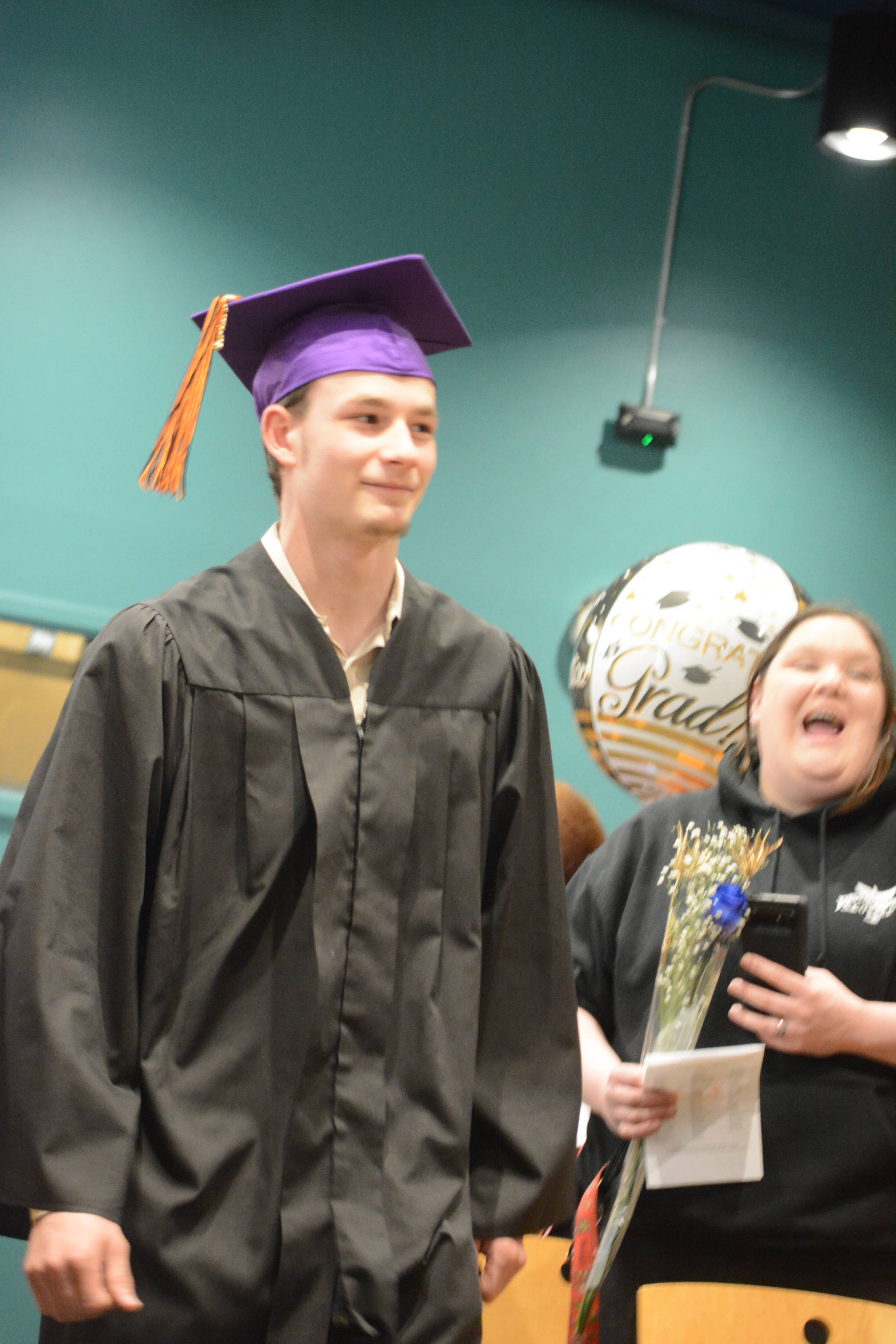 Flex High School graduate Matthew Prescott walks during the processional. Nine students graduated from Flex on Tuesday night, May 22, 2018, at the Alaska Islands and Ocean Visitor Center auditorium, Homer, Alaska. (Photo by Michael Armstrong / Homer News)