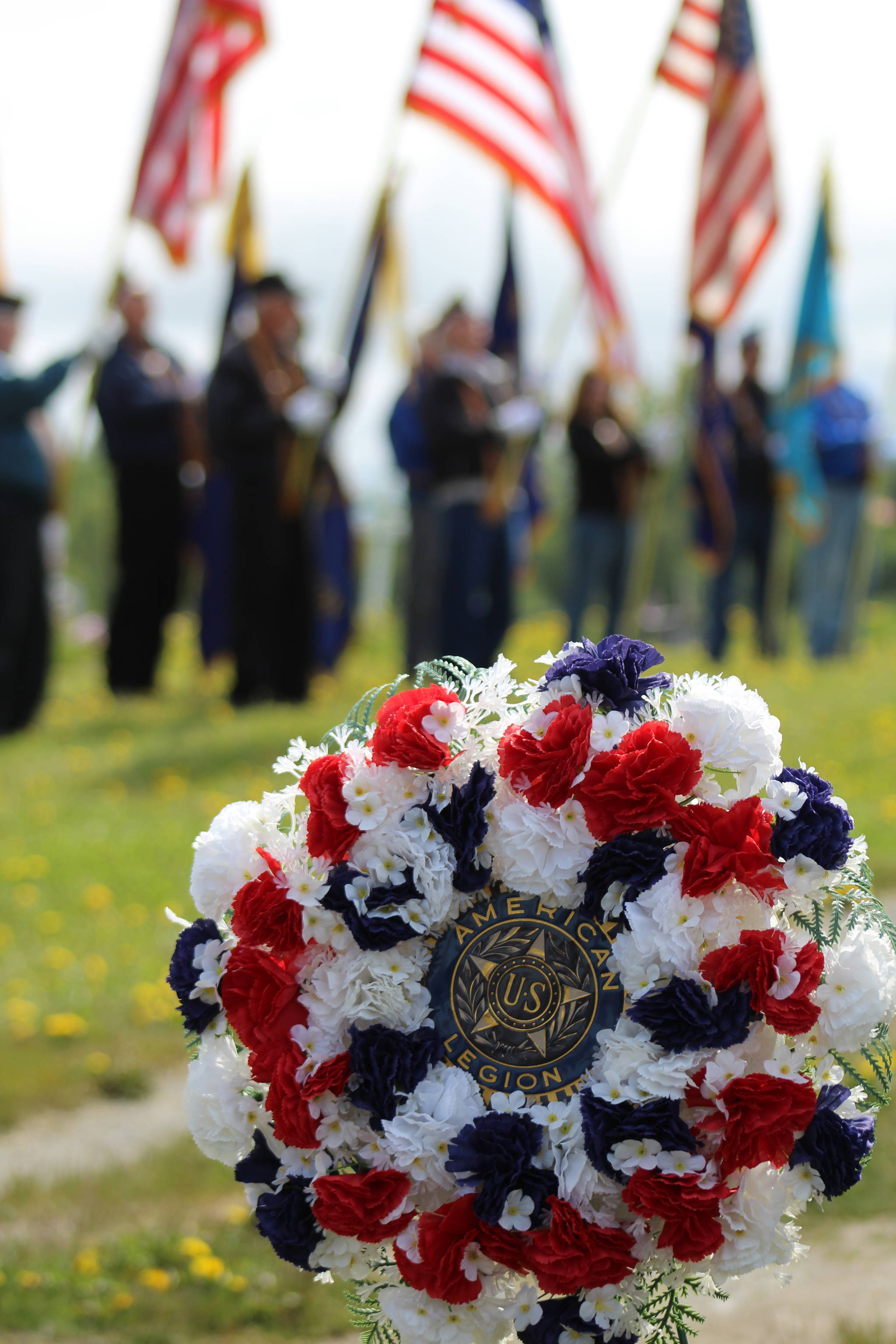 An American Legion flower wreath decorated the Ninilchik Cemetery at a 2106 Memorial Day service to honor those fallen in battle. (Homer News file photo)