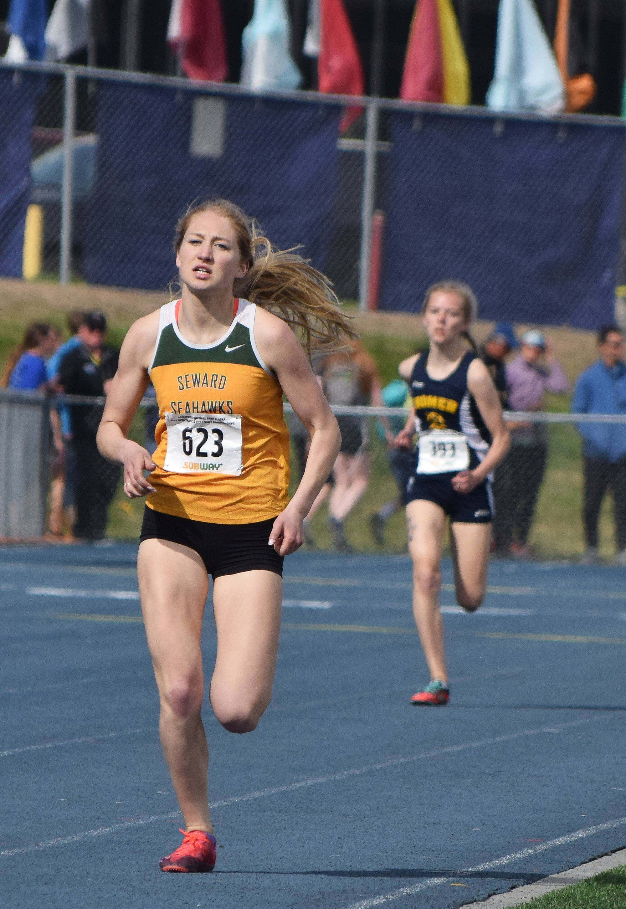Seward’s Ruby Lindquist kicks it in down the stretch of the Division II girls 800-meter race Saturday afternoon at the Alaska Track and Field state championship meet at Palmer High School. (Photo by Joey Klecka/Peninsula Clarion)