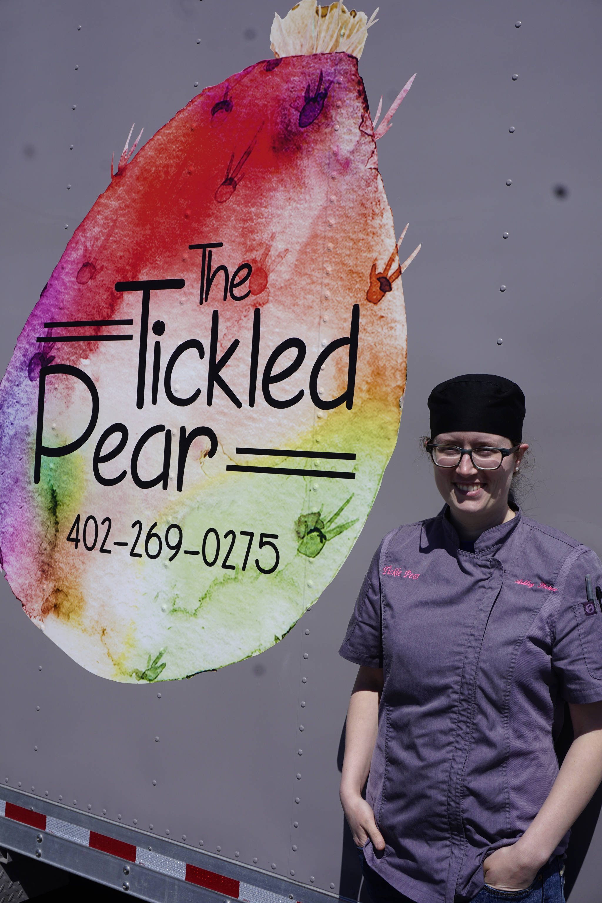 Ashley Steiner stands by her food trailer, The Tickled Pear, on Friday, June 1, 2018, at its spot near Coal Point Seafoods on the Homer Spit. (Photo by Michael Armstrong/Homer News)