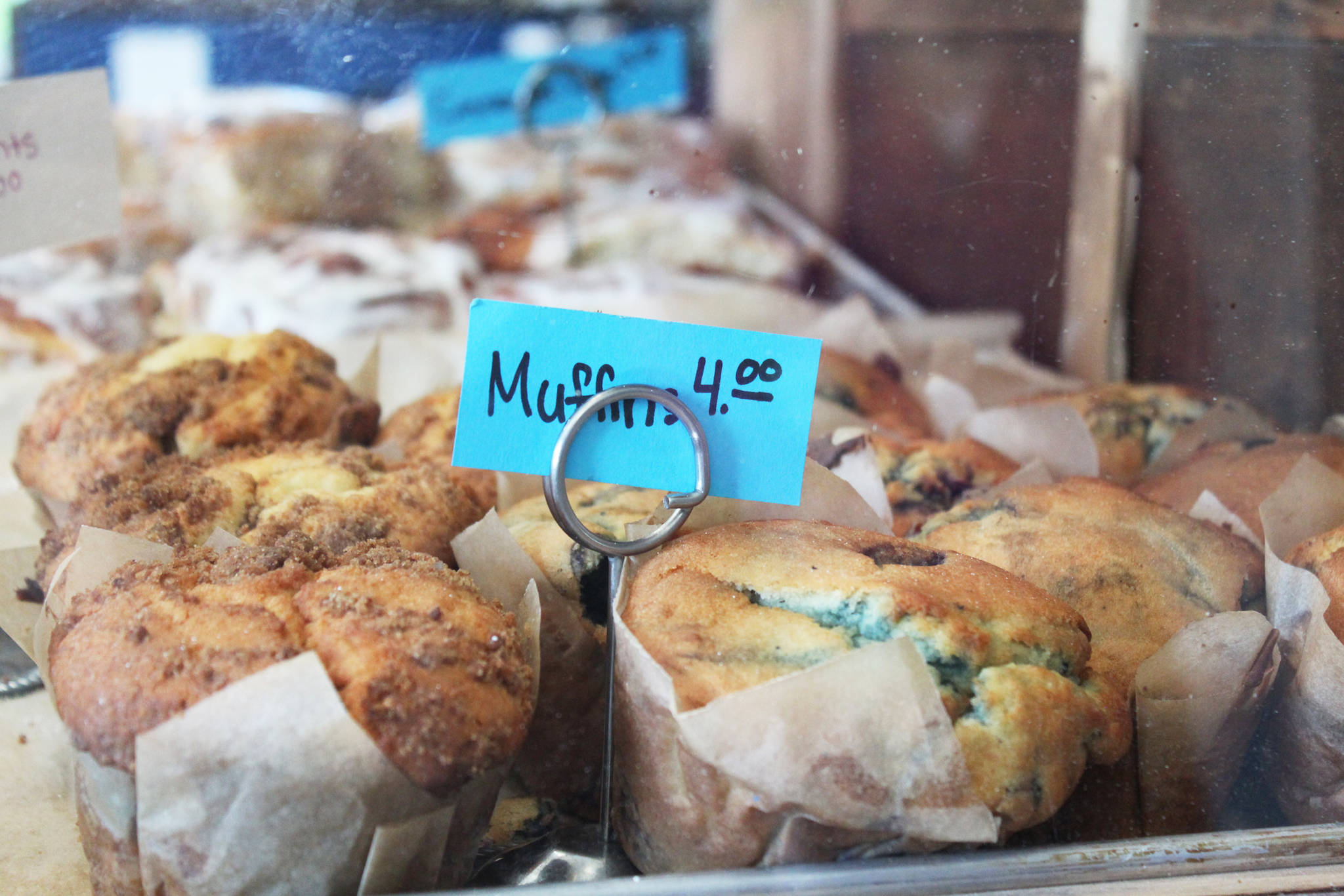 Muffins wait to be bought and eaten inside Blue Sunshine Bakery and Cafe, a new Homer establishment, on Tuesday, June 12, 2018 in Homer, Alaska. (Photo by Megan Pacer/Homer News)