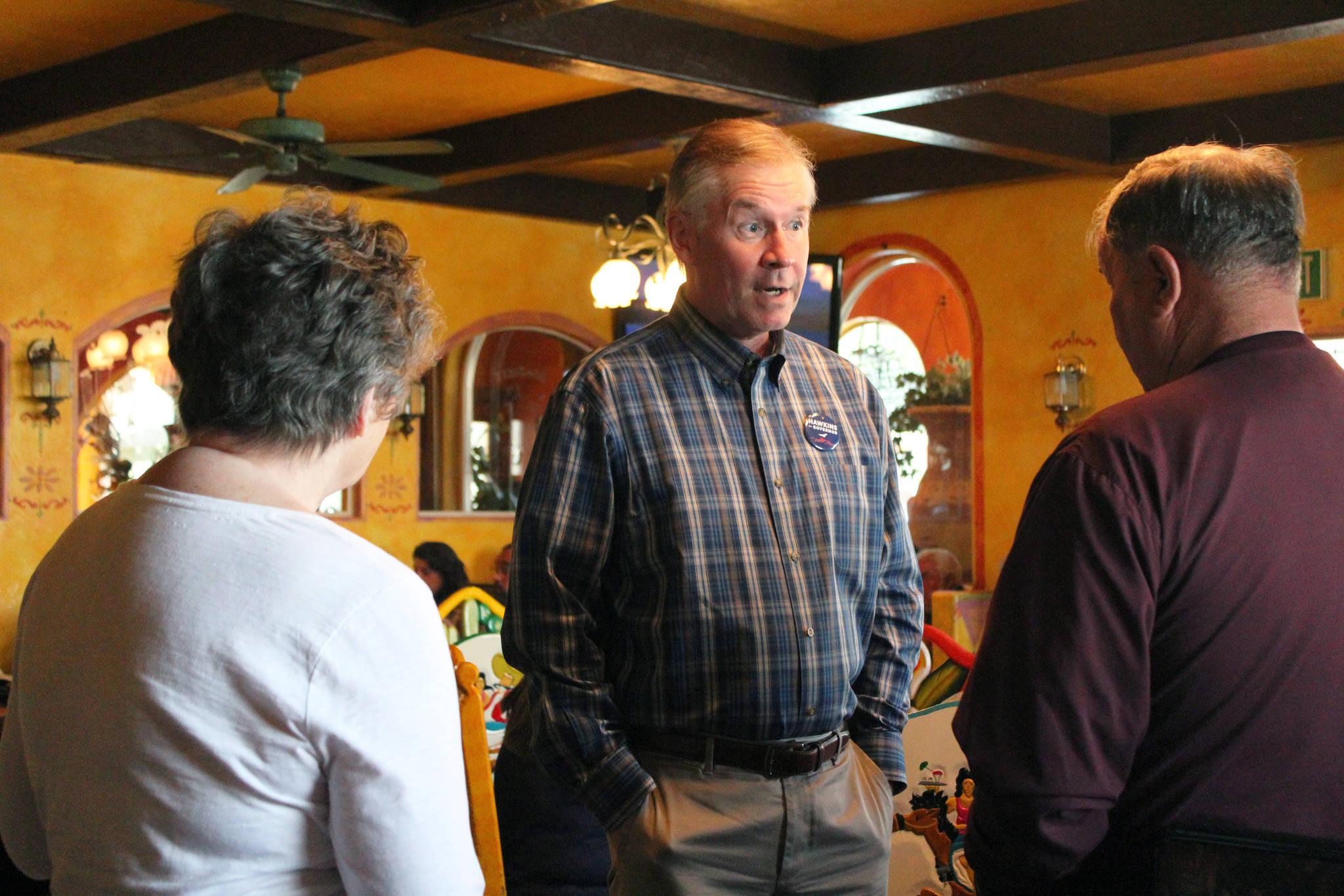 Scott Hawkins, a Republican candidate for Alaska governor, talks with local residents before a campaign pitch Thursday, June 7, 2018 at Don Jose’s in Homer, Alaska. (Photo by Megan Pacer/Homer Alaska. (Photo by Megan Pacer/Homer News)
