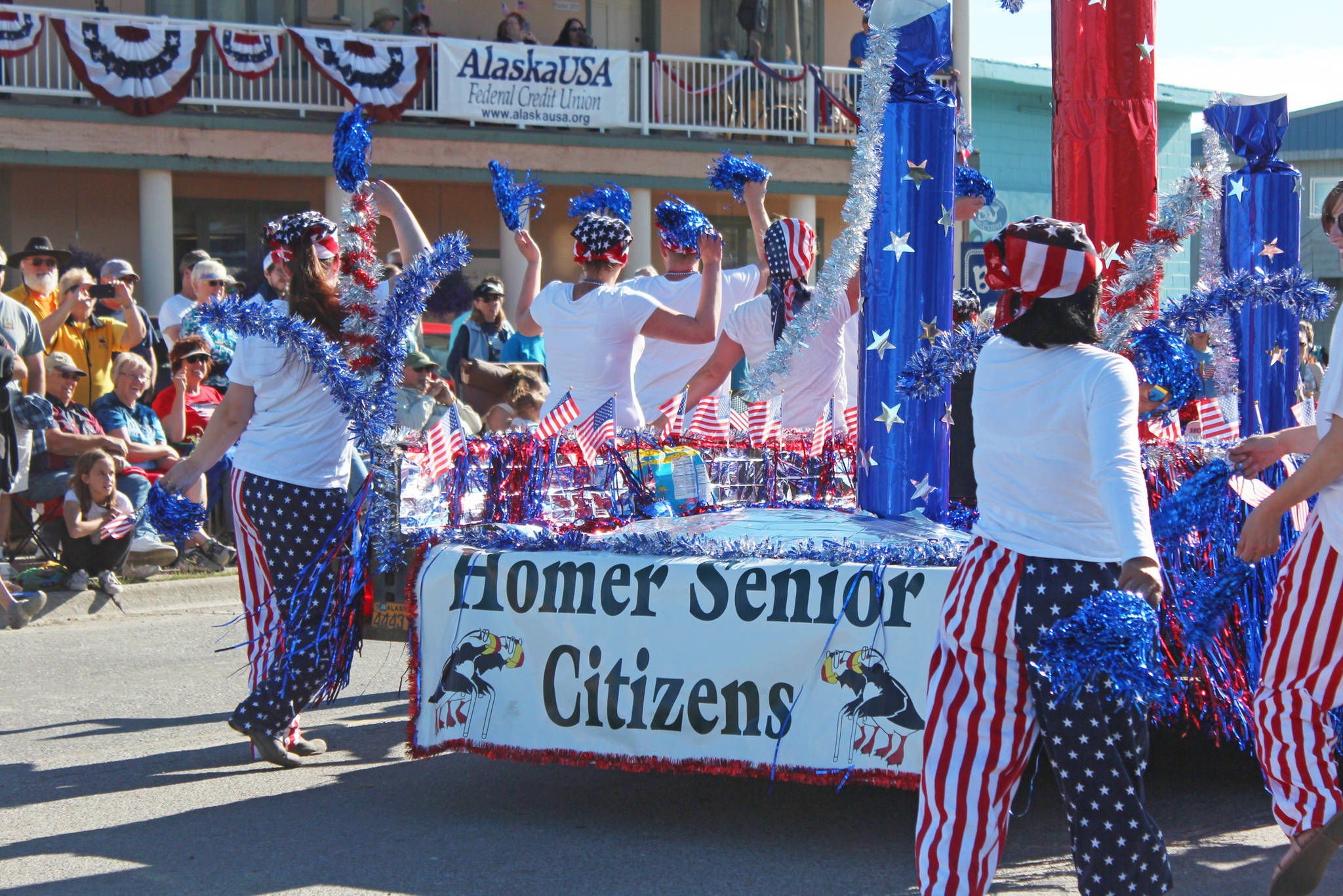 Representatives of the Homer Senior Citizens Center march and dance in this year’s Independence Day parade Wednesday, July 4, 2018 in Homer, Alaska. (Photo by Megan Pacer/Homer News)