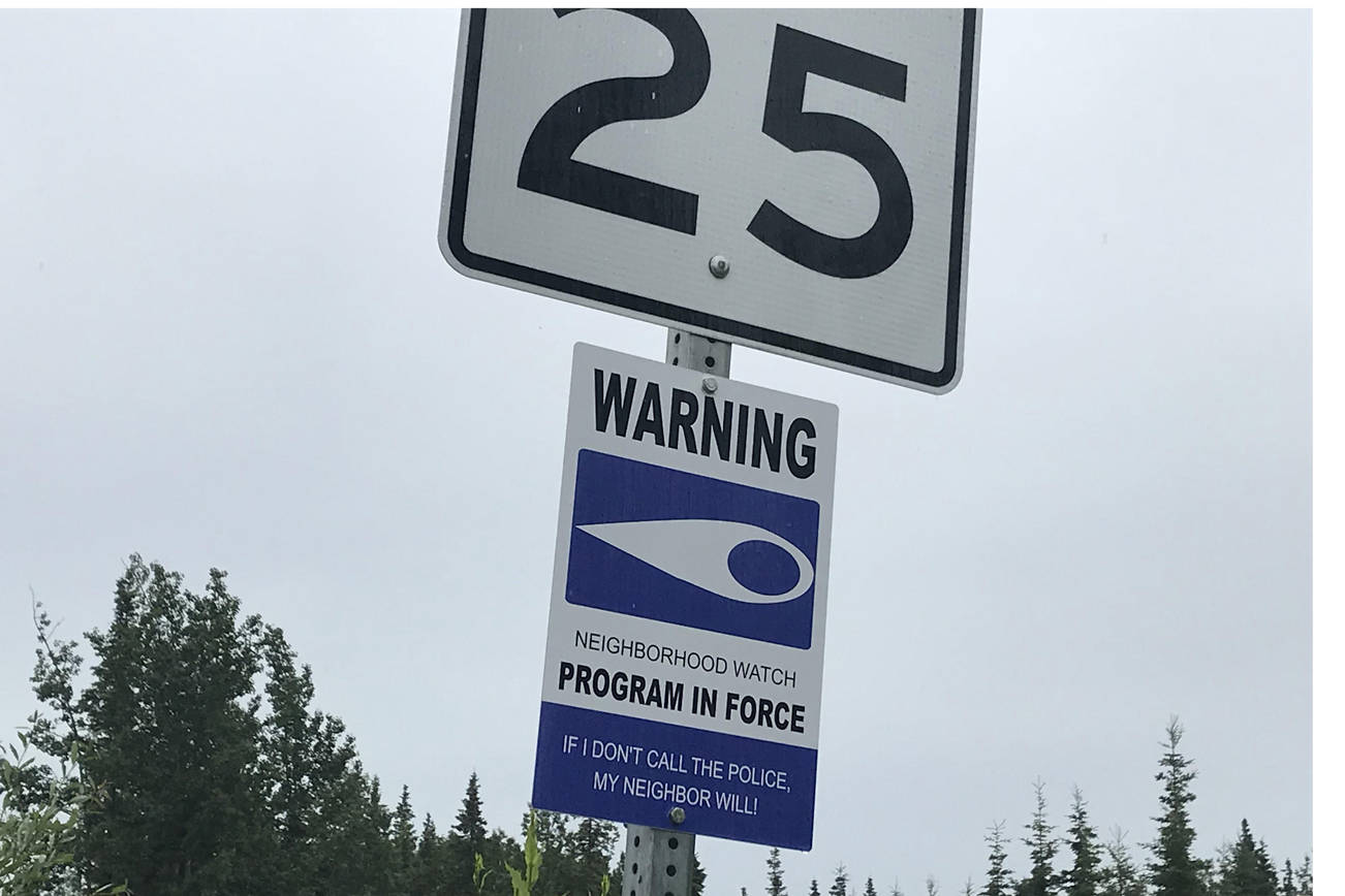 A Neighborhood Watch sign on Matanuska Street in Soldotna is one of the tools citizens use in setting up the crime prevention program. (Photo by Vincent Nusingaya/Peninsula Clarion)