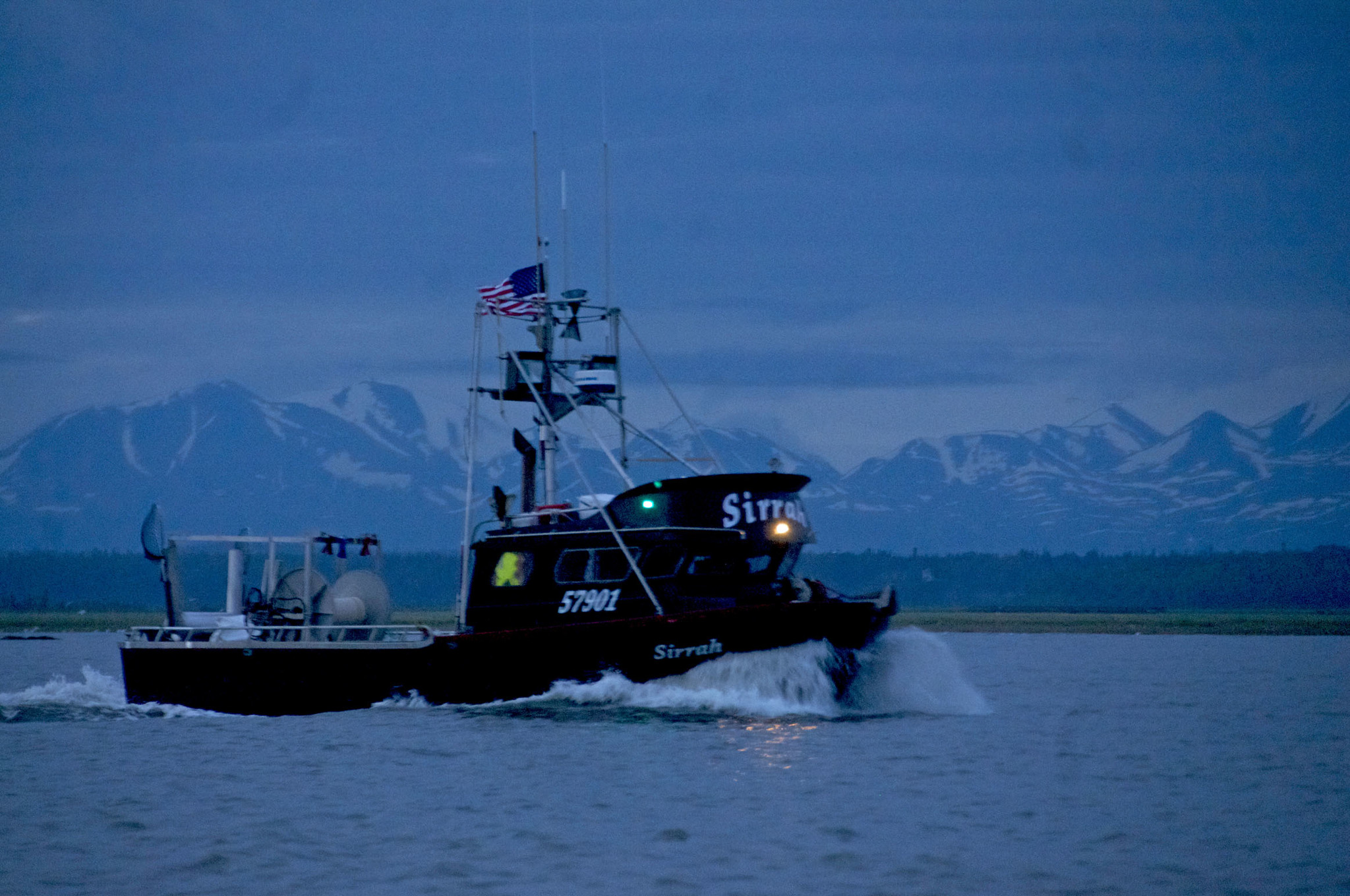 A drift gillnet fishing vessel makes its way out of the mouth of the Kenai River in this July 2016 file photo near Kenai, Alaska. (Elizabeth Earl/Peninsula Clarion0