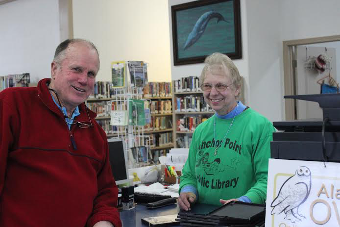 Bob and Lora Craig pose in Anchor Point’s new library building. Bob Craig is the library board’s president; Lora Craig is the librarian.-Photo by McKibben Jackinsky