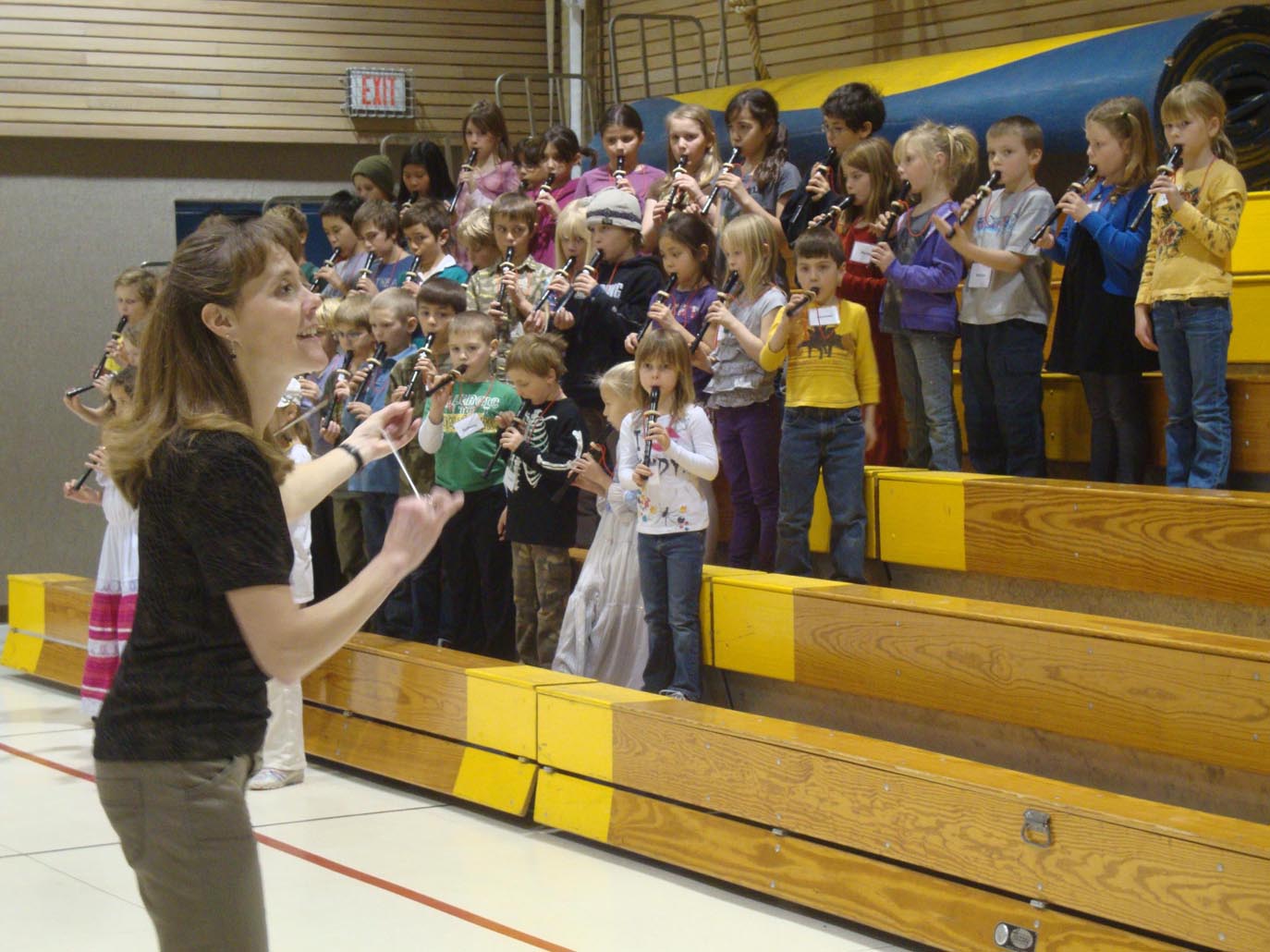 Tammy Vollom-Matturro, Kenai Peninsula Orchestra’s artistic director and conductor, prepares McNeil Canyon Elementary Students for a concert at Mariner Theatre at 2 p.m. Sunday.
