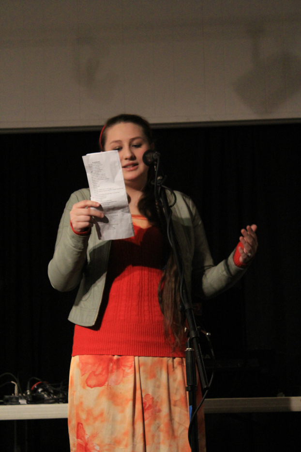Maria Kulikov, 17, reads her poem in the final round.-photo by Fermin Martinez
