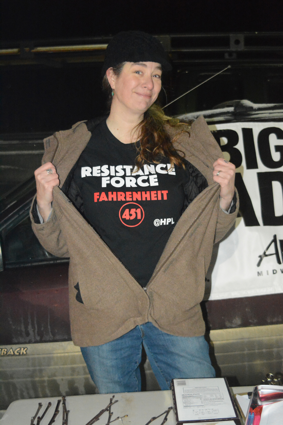 Friends of the Homer Public Library coordinator and poet Erin Hollowell shows off her “Fahrenheit 451” T-shirt at last Friday’s Big Read kickoff celebration.-Photo by Michael Armstrong, Homer News