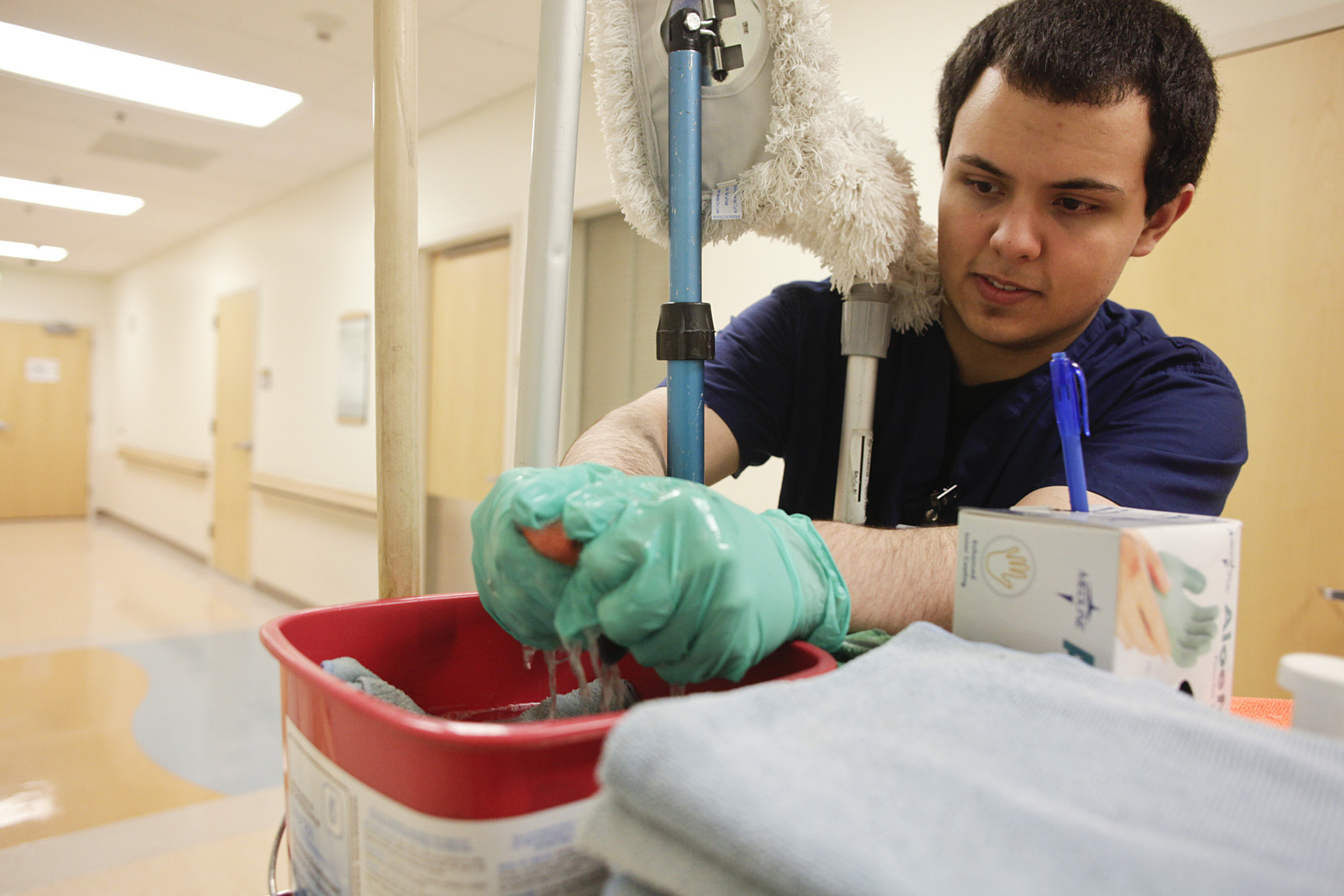 Vincent “Vin” Chavarrir prepares to clean a patient’s room at Central Peninsula Hospital in Soldotna. Chavarrir is an intern with Project SEARCH.