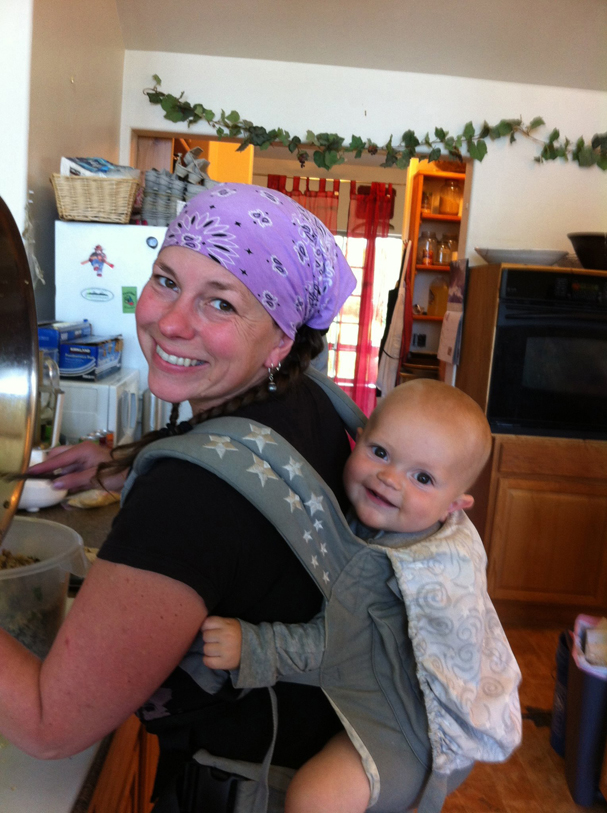 Amy Welty, with son Andrew, prepares a meal for a recent class. -Photo provided