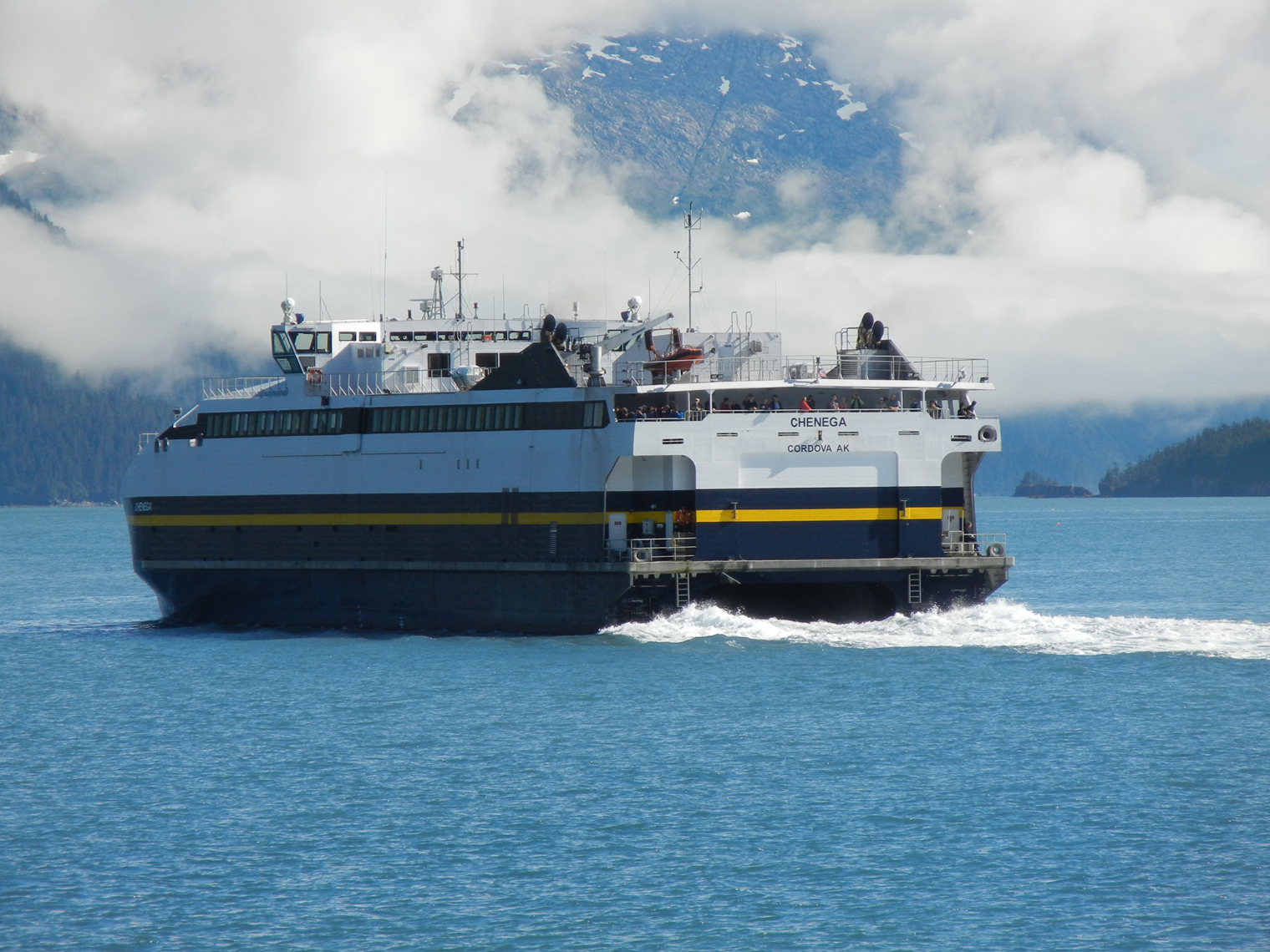 Budget cuts to the Alaska Marine Highway System could lead to significant service reductions when the 2016 state fiscal year begins July 1. For now, a conference committee has restored some cuts to the fast ferry Chenega’s Prince William Sound service. The Chenega is shown here steaming out of Whittier.-Photo by Andrew Jensen, Morris News Service - Alaska