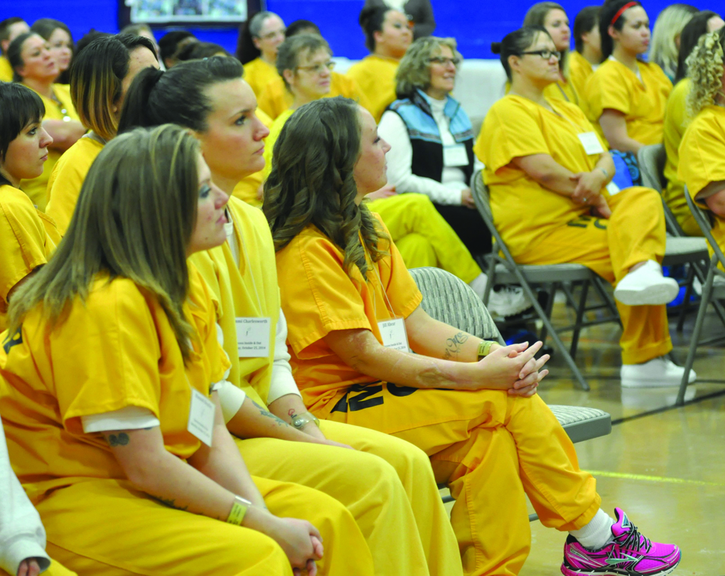 Hiland Mountain Correctional Center inmates listen as former inmates offer tips for transitioning out of prison life during the “Probation Tips for Success” session on Oct. 25. The Hiland inmates attended the workshop sessions as part of the Success Inside & Out program. -Photo by Cinthia Ritchie, Morris News Service - Alaska