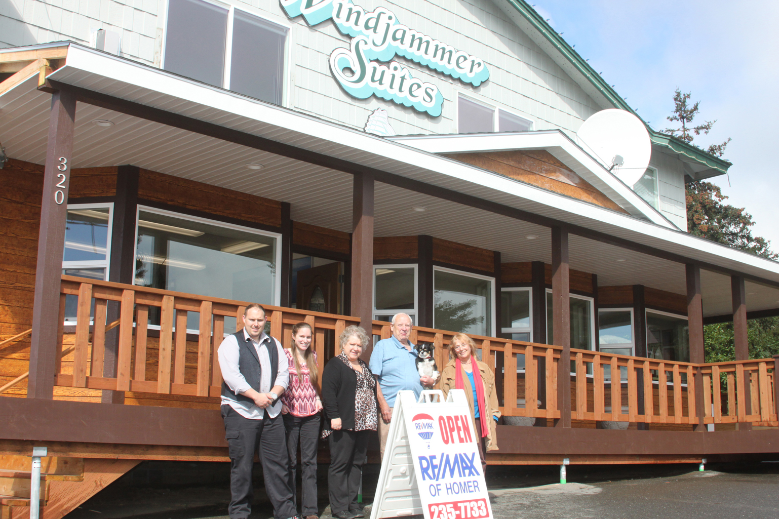 The staff from Re/Max of Homer and Homer Property Management stand outside their new and renovated location on Pioneer Avenue. From left to right are Daniel Yager, Michelle Simpson, Shelly Stradling, owner Terry Yager and Marjolein Cardon.-Photo by Shannon Reid