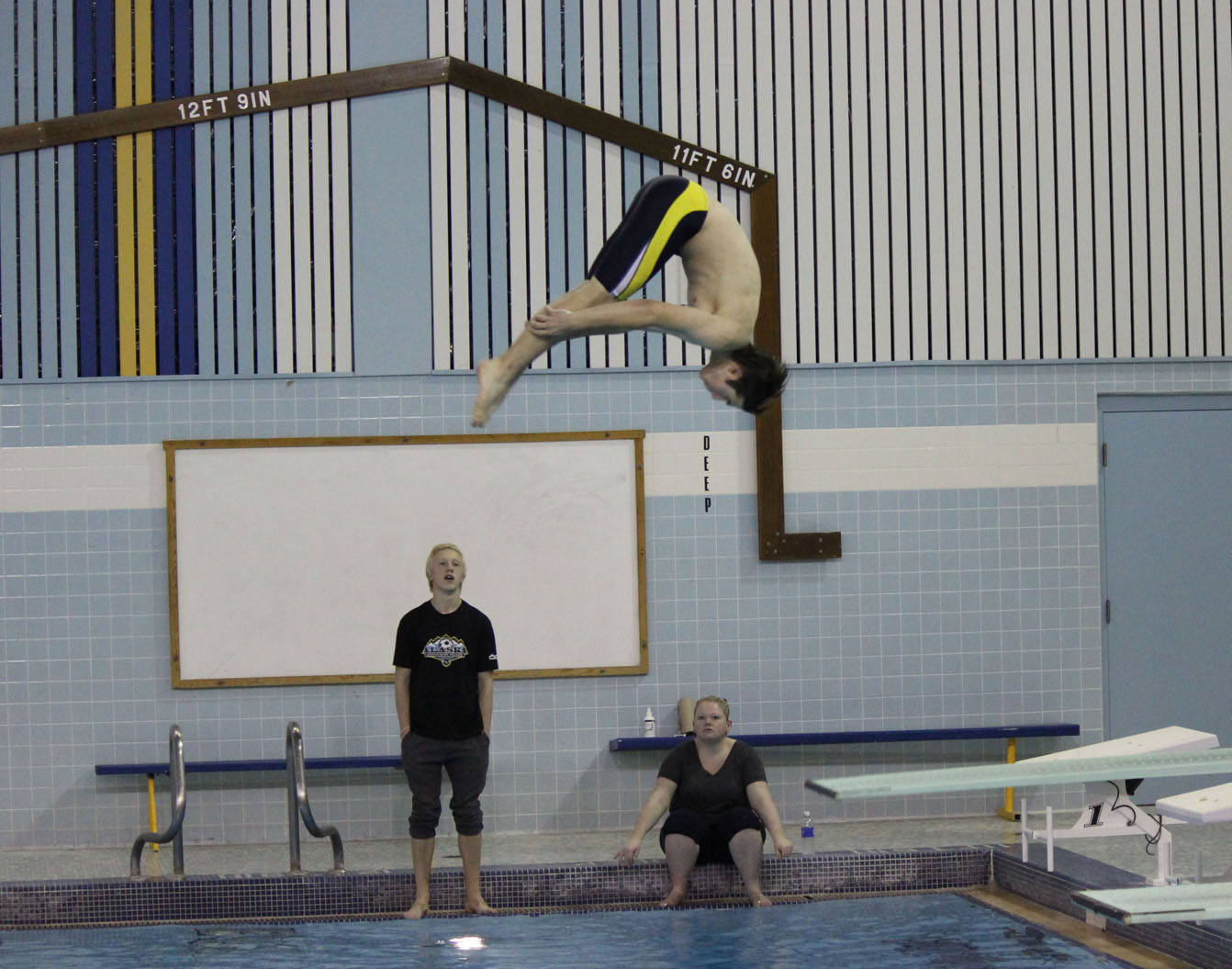 Mariner dive team members Danny Wiest, above, and Ian Hall, below, perfect their dives in preparation for Regions competition in Soldotna Oct. 30-Nov. 1.-Photos by McKibben Jackinsky, Homer News
