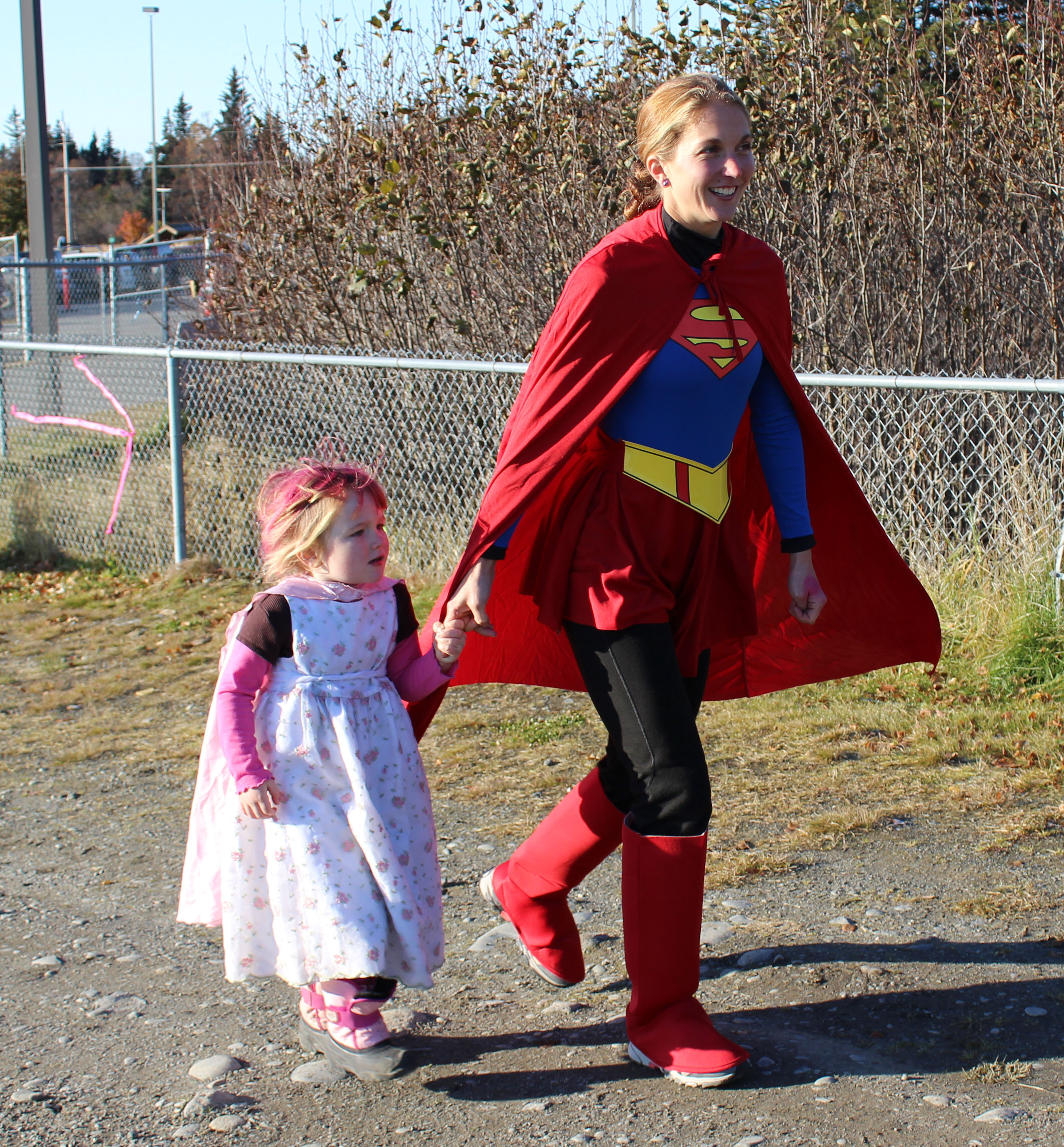 Joy Ridgley and her mom, Annie, let their super-hero selves shine through in Saturday’s Girls On the Run 5k-Photo by McKibben Jackinsky, Homer News