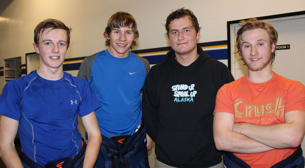 From left, Dawson Roberts, JJ Sonnen, Anton Kuzmin and Clem Tillion catch their breath after practicing with the Mariner Co-Op Hockey Team at the Kevin Bell Arena on Monday. -Photo by McKibben Jackinsky, Homer News