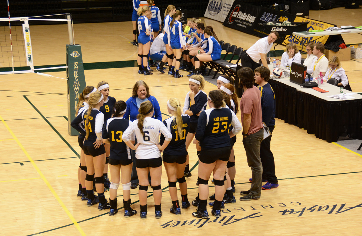 Mariner Head Coach Beth Trowbridge talks strategy during the intense Match 6 of the 3A winners bracket against Monroe at the 2014 State Volleyball Tournament at the new Alaska Airlines Center.-Photo by Stephanie Pitzman