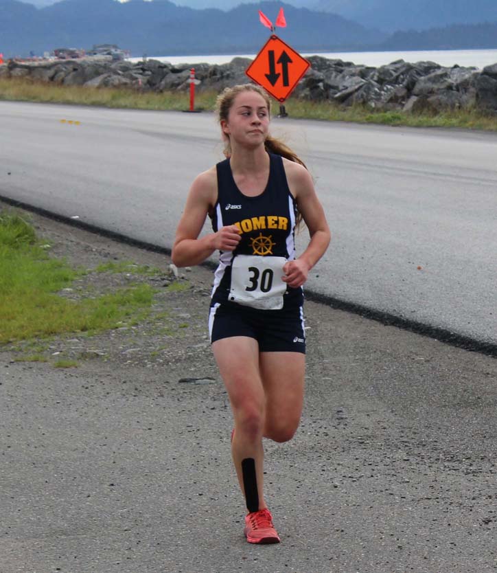 the Mariner team’s fifth-place finisher, Lauren Evarts, secures the team’s first place. -Photo by McKibben Jackinsky, Homer News