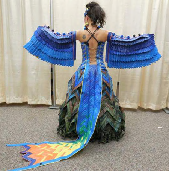 A Juneau artist models her tarpaulin bird costume
